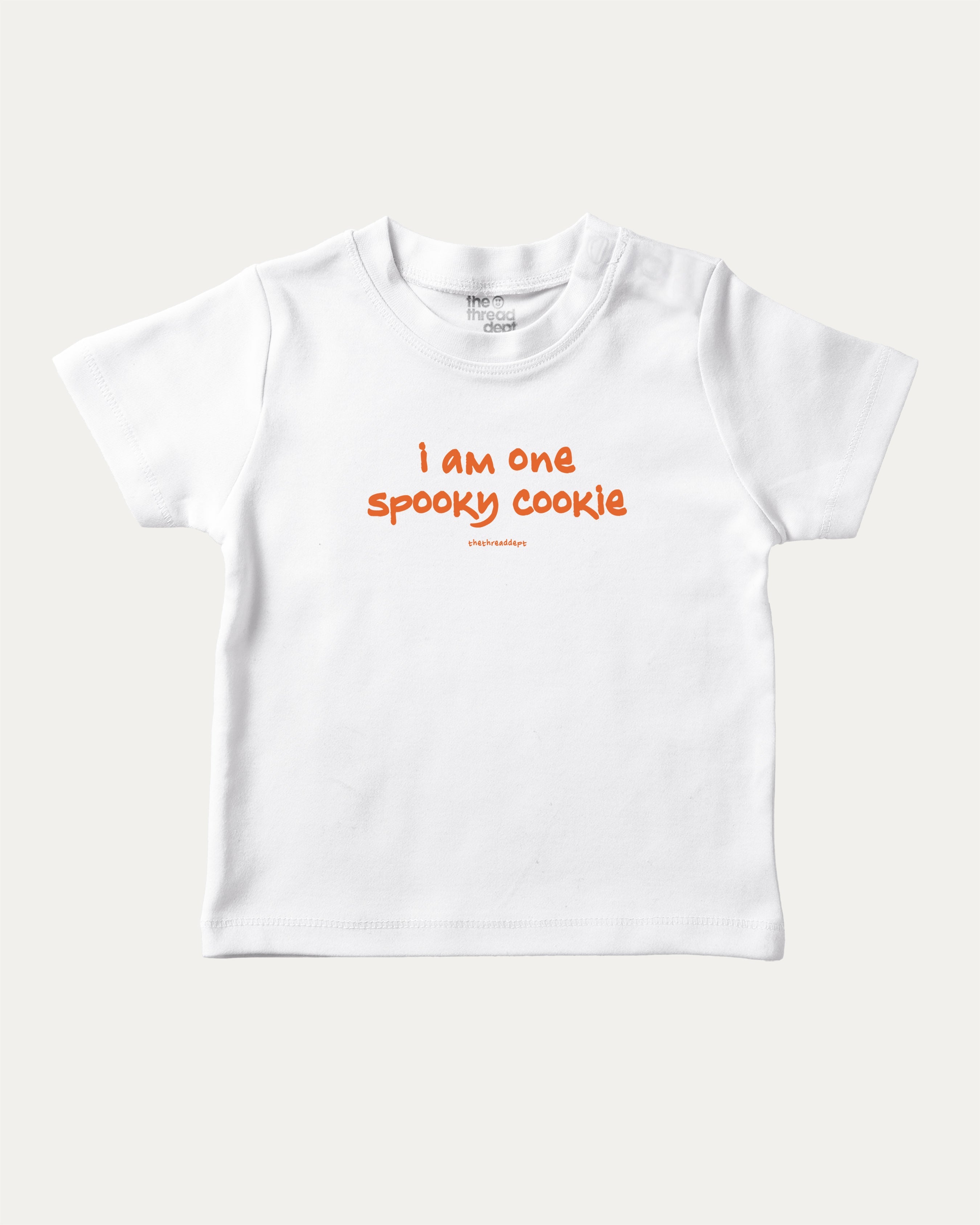 I am one spooky cookie graphic tee with bold and humorous print, Halloween Graphic T shirt, Spooky T shirt, Perfect Gift for Halloween Day, funny and trendy graphic. Perfect for adults and gift-giving. White shirt.