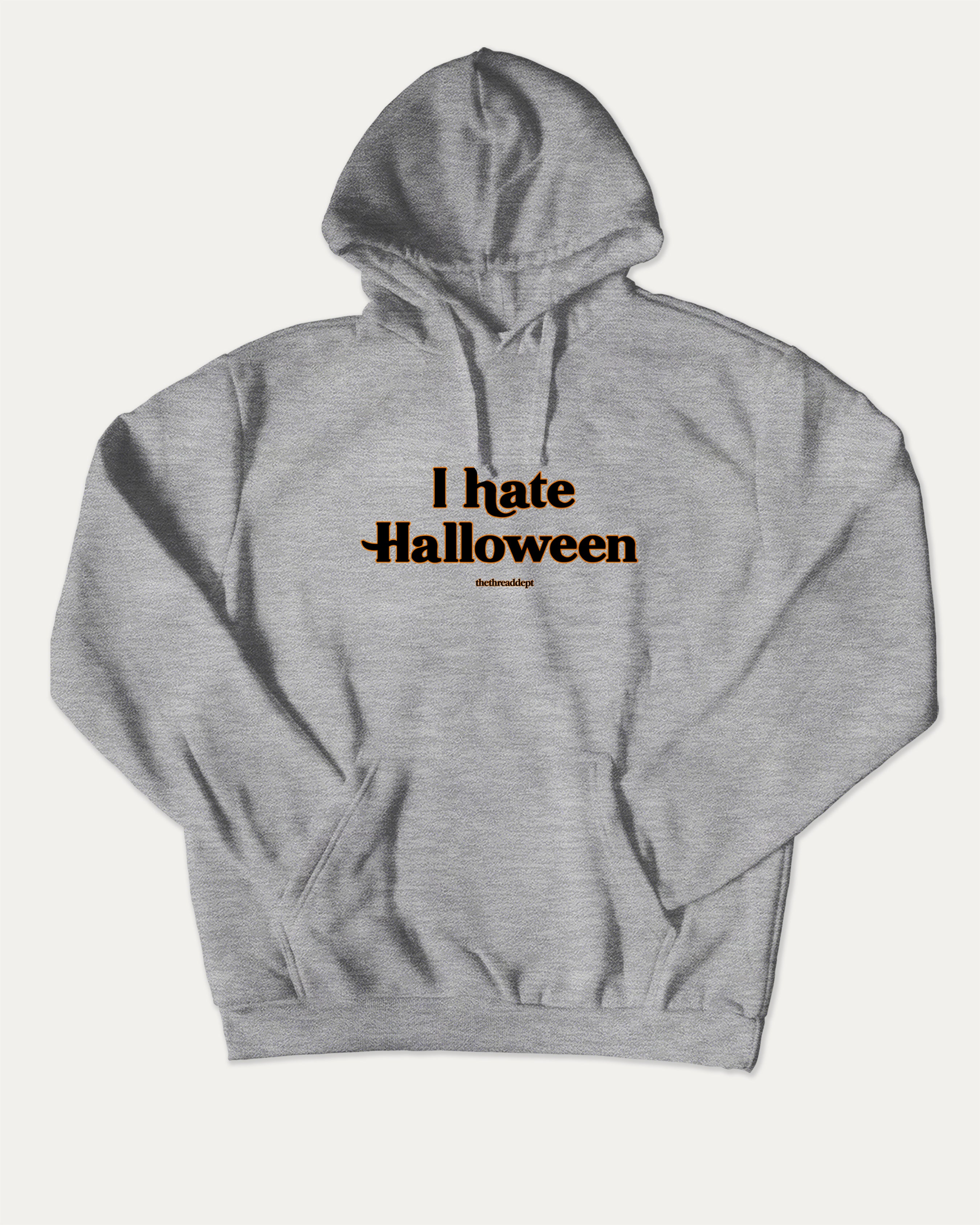I Hate Halloween graphic hoodie with funny and trendy artwork, casual streetwear with bold personality. Great for adults and gifting. Heather Grey hoodie.