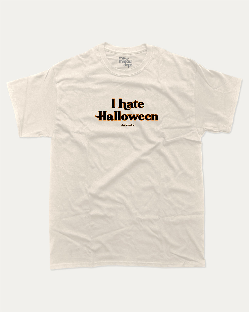 I Hate Halloween graphic t-shirt with bold and funny print, funny and trendy graphic. Perfect funny Halloween gifts for friends and family. Cream shirt.