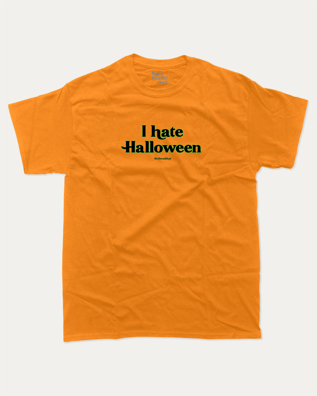 I Hate Halloween graphic t-shirt with bold and funny print, funny and trendy graphic. Perfect funny Halloween gifts for friends and family. Orange shirt.