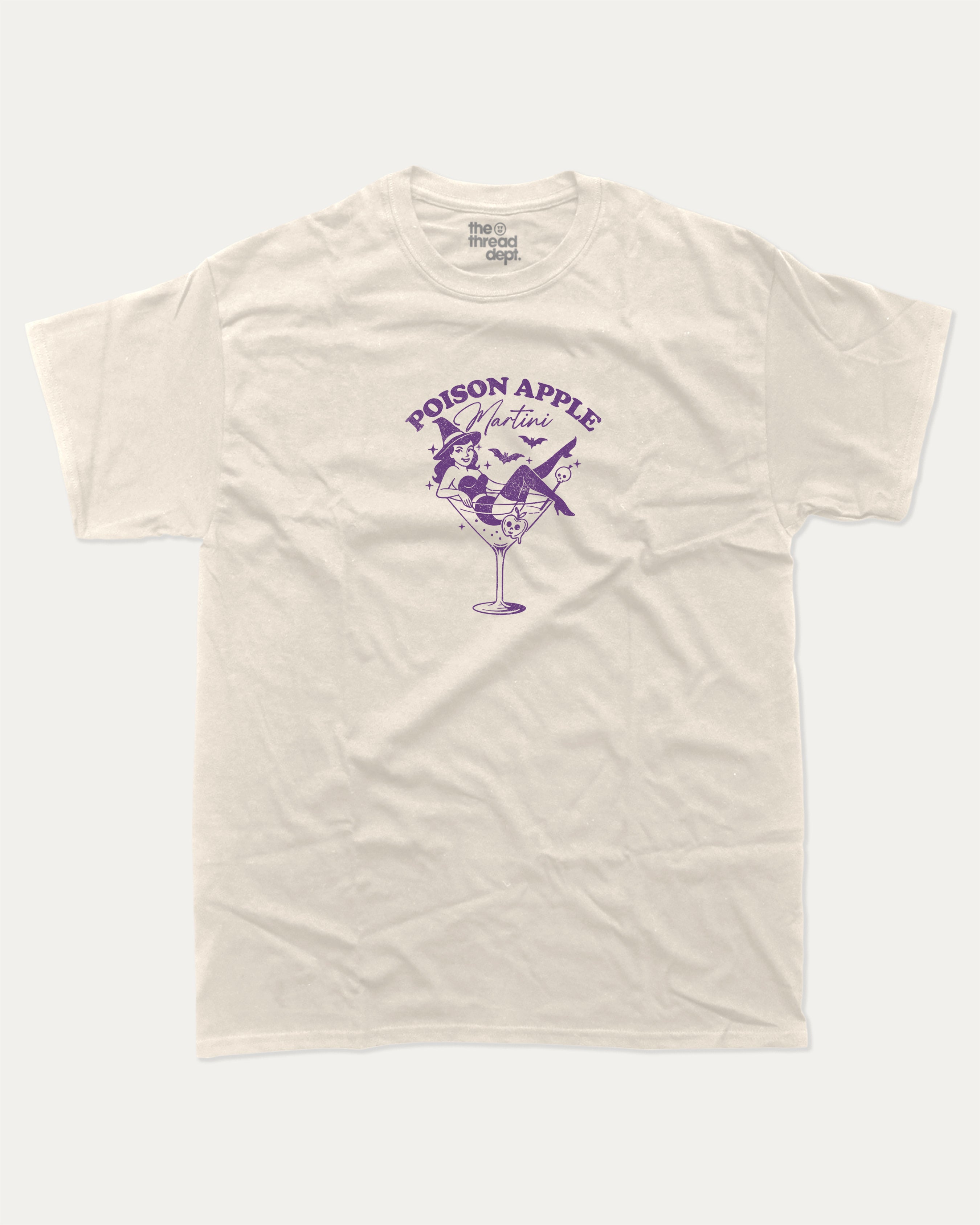 Poison Apple Martini graphic tee with bold and humorous print, funny and trendy graphic. Halloween Gift Graphic T shirt, Spooky Halloween Graphic T shirt,  Perfect for adults and gift-giving. Cream shirt.