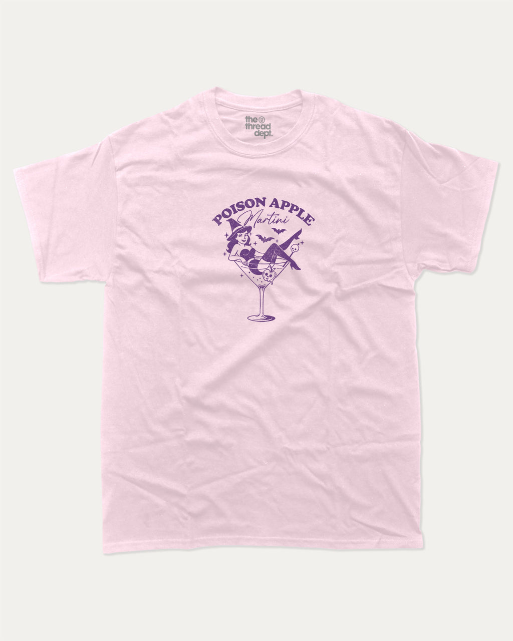 Poison Apple Martini graphic tee with bold and humorous print, funny and trendy graphic. Halloween Gift Graphic T shirt, Spooky Halloween Graphic T shirt,  Perfect for adults and gift-giving. Pink shirt.