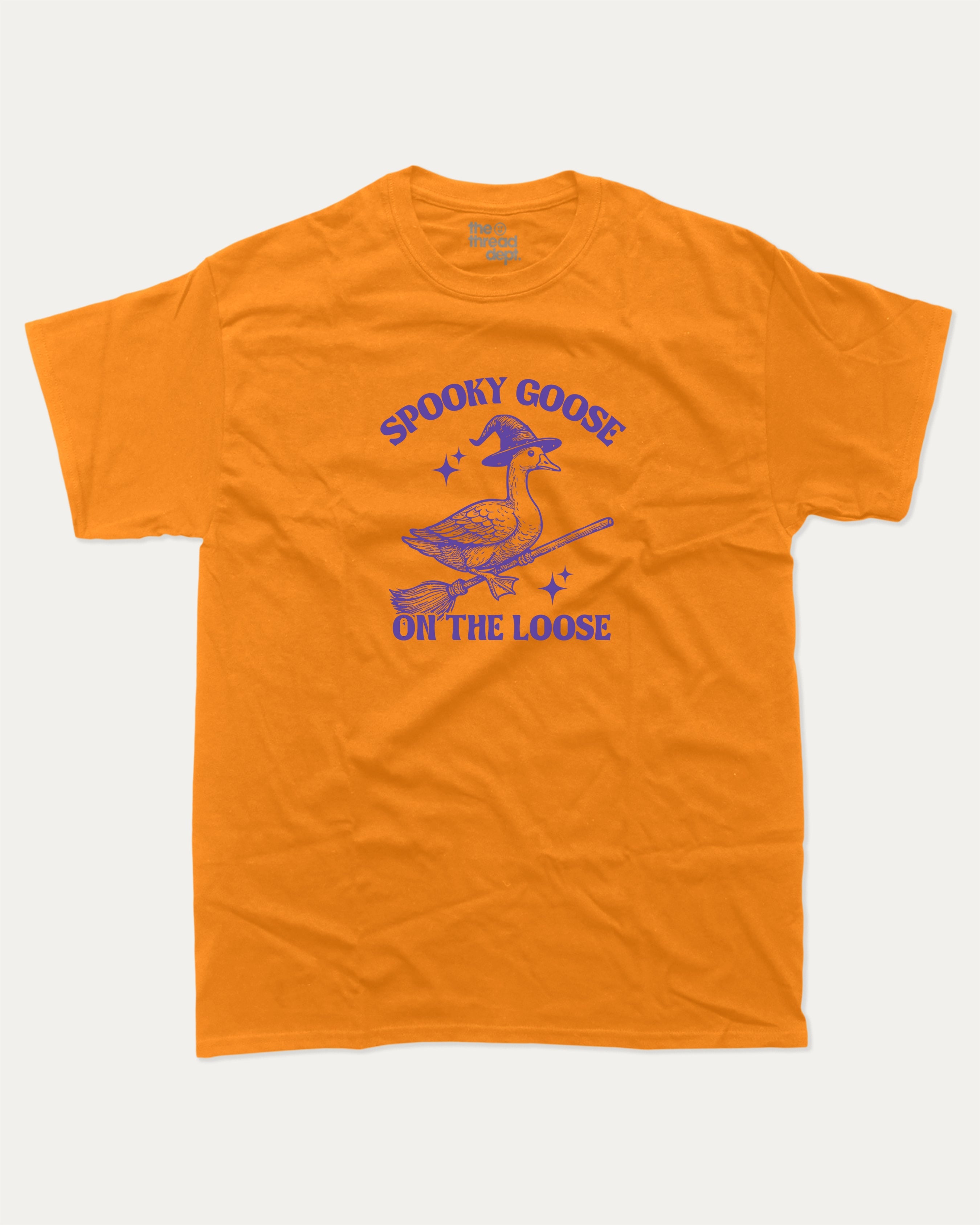 Spooky Goose graphic tee with bold and humorous print, funny and trendy graphic. Perfect Gift for Halloween, Halloween Graphic T shirt, Halloween animal Graphic t shirt, animal lovers t shirt,  Perfect for adults and gift-giving. Orange shirt.