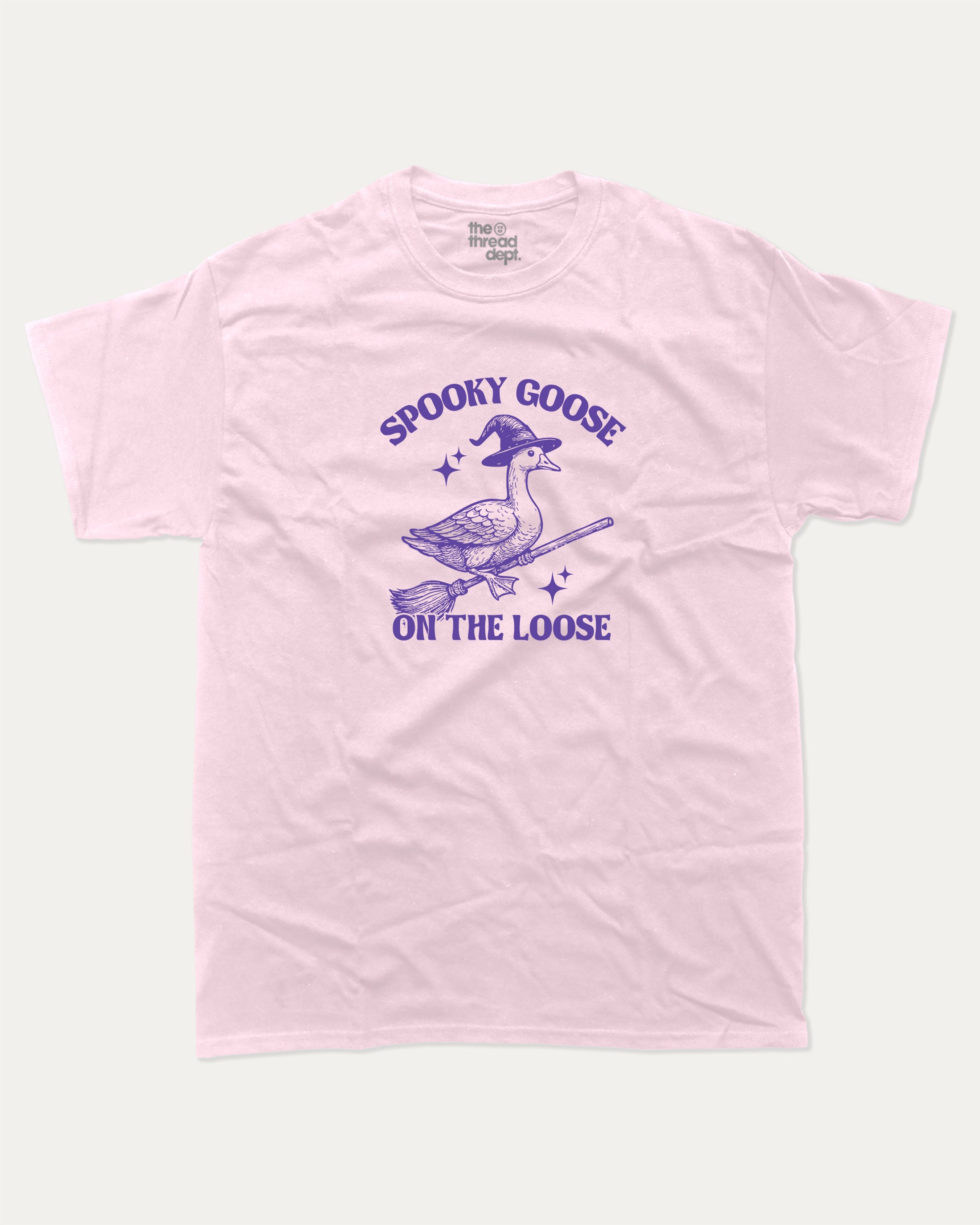 Spooky Goose graphic tee with bold and humorous print, funny and trendy graphic. Perfect Gift for Halloween, Halloween Graphic T shirt, Halloween animal Graphic t shirt, animal lovers t shirt,  Perfect for adults and gift-giving. Pink shirt.