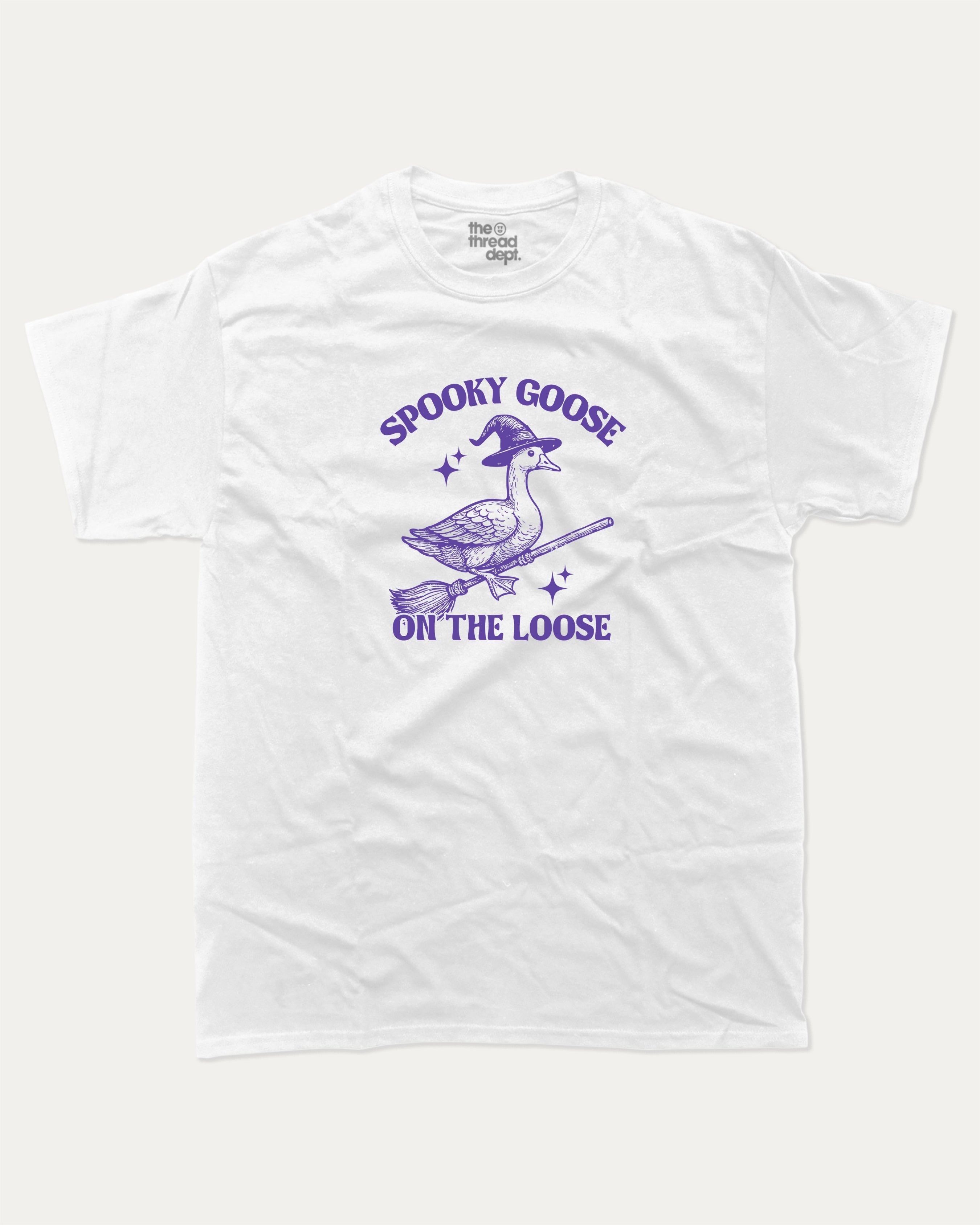 Spooky Goose graphic tee with bold and humorous print, funny and trendy graphic. Perfect Gift for Halloween, Halloween Graphic T shirt, Halloween animal Graphic t shirt, animal lovers t shirt,  Perfect for adults and gift-giving. White shirt.