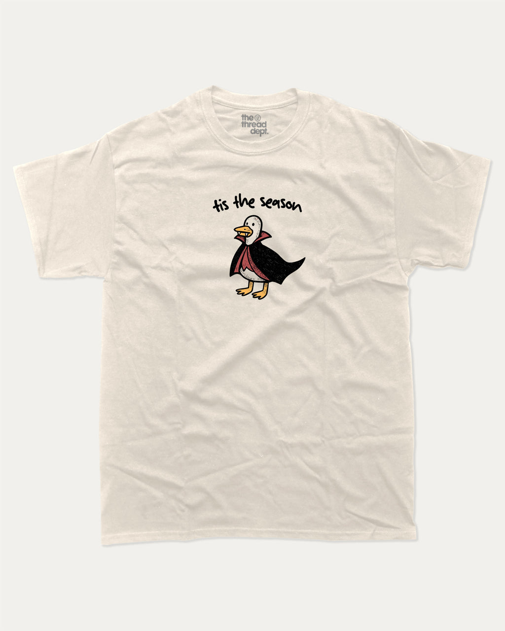 Tis The Season graphic tee with retro vintage sardines print, funny and trendy graphic. Perfect for adults and gift-giving. Cream shirt.