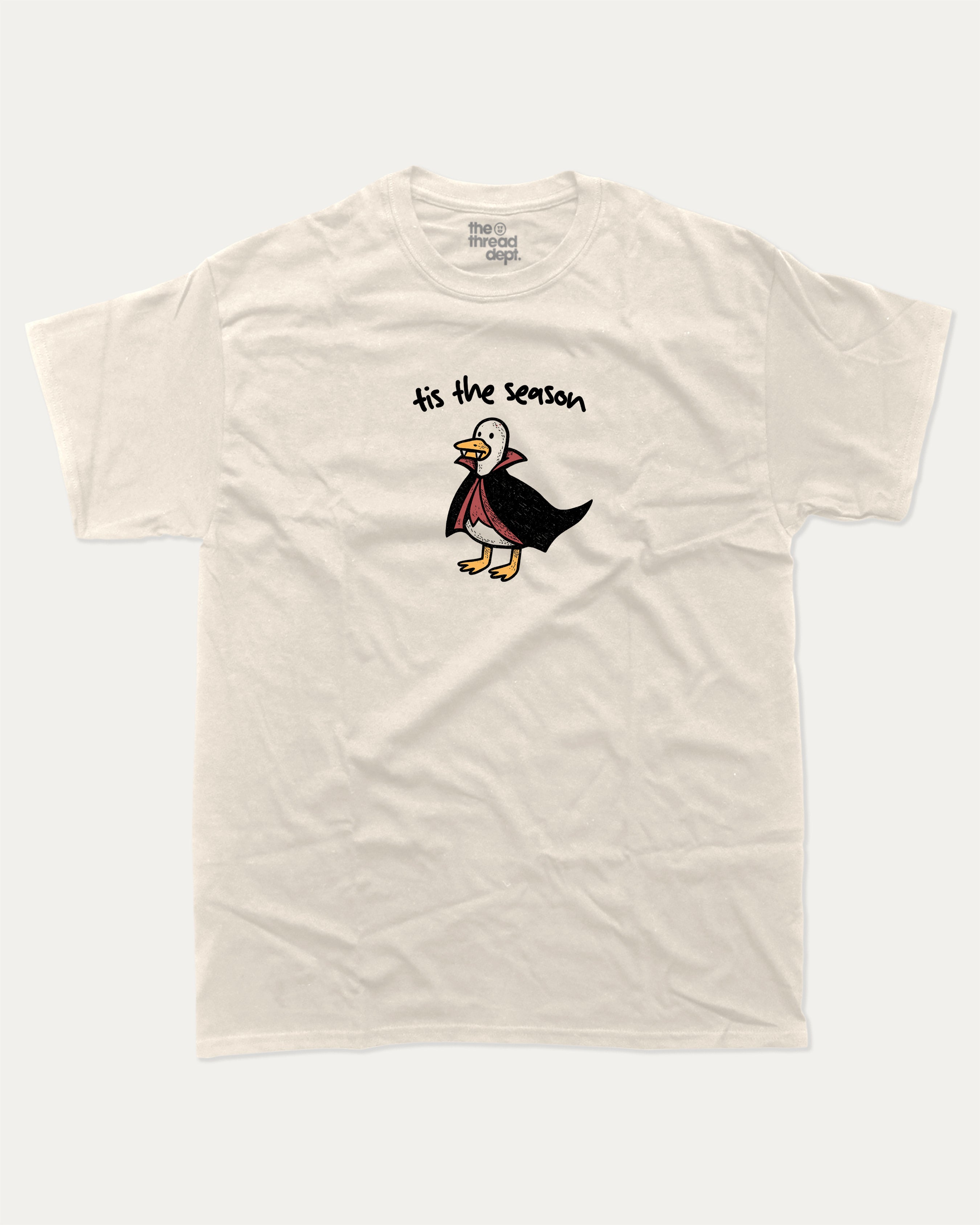Tis The Season graphic tee with retro vintage sardines print, funny and trendy graphic. Perfect for adults and gift-giving. Cream shirt.