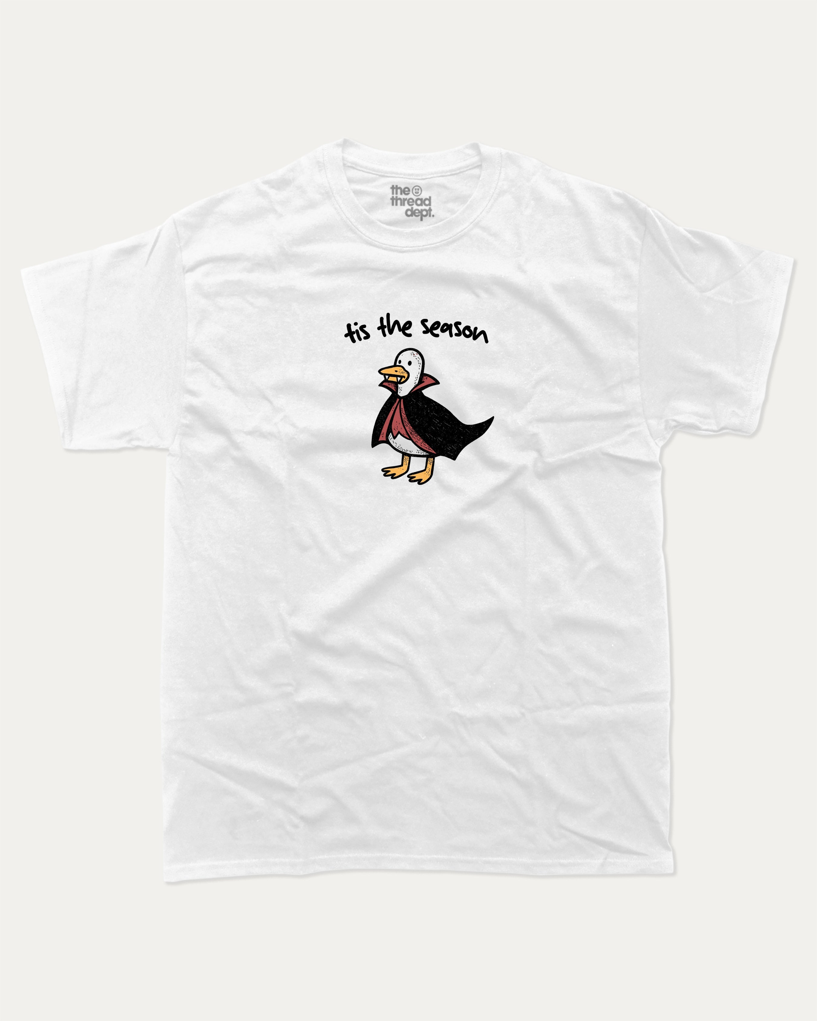 Tis The Season graphic tee with retro vintage sardines print, funny and trendy graphic. Perfect for adults and gift-giving. White shirt.