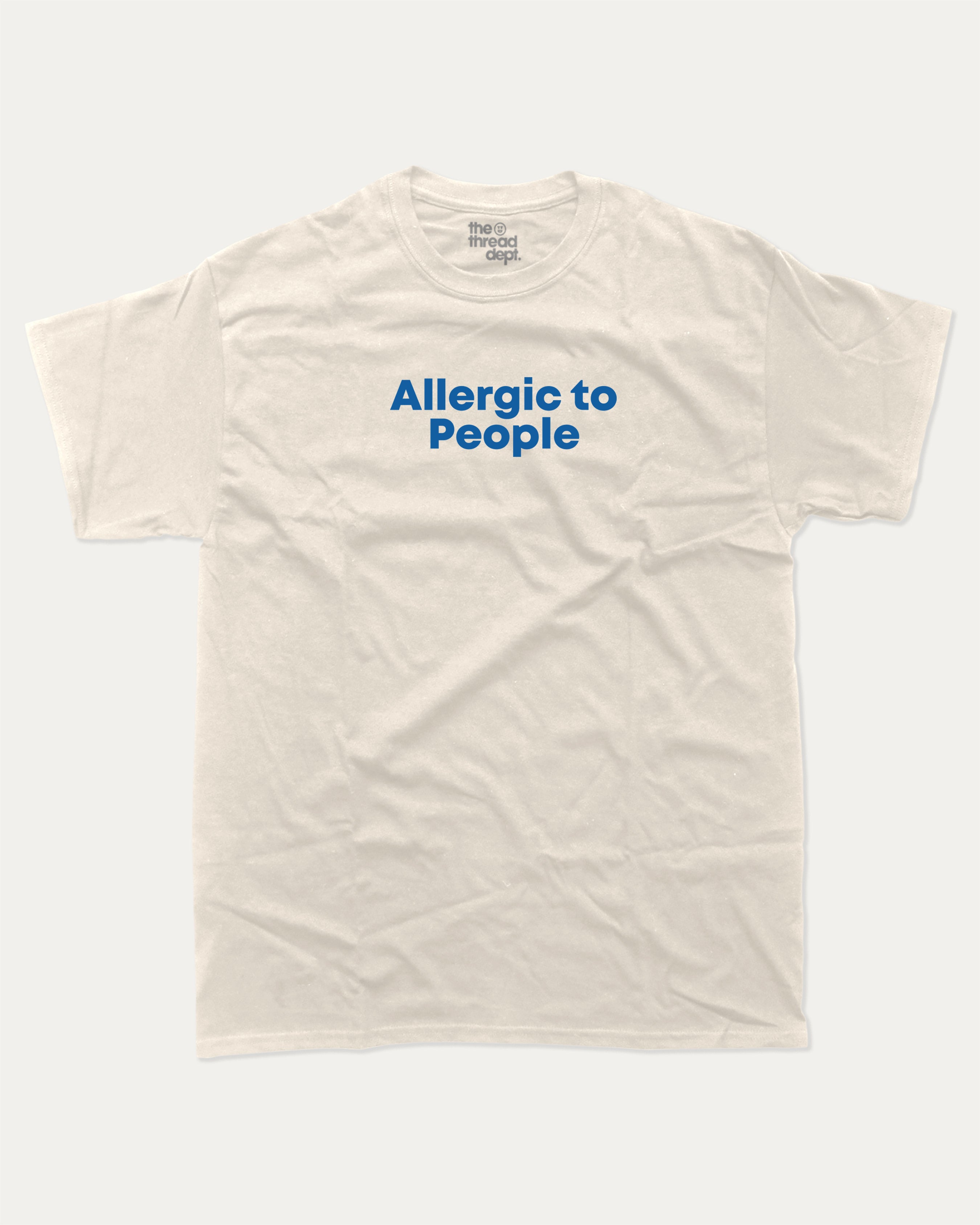 Allergic to People graphic tee with bold and humorous print, funny and trendy graphic. Perfect for adults and gift-giving. Cream shirt.