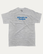 Allergic to People graphic tee with bold and humorous print, funny and trendy graphic. Perfect for adults and gift-giving. Heather Grey shirt.