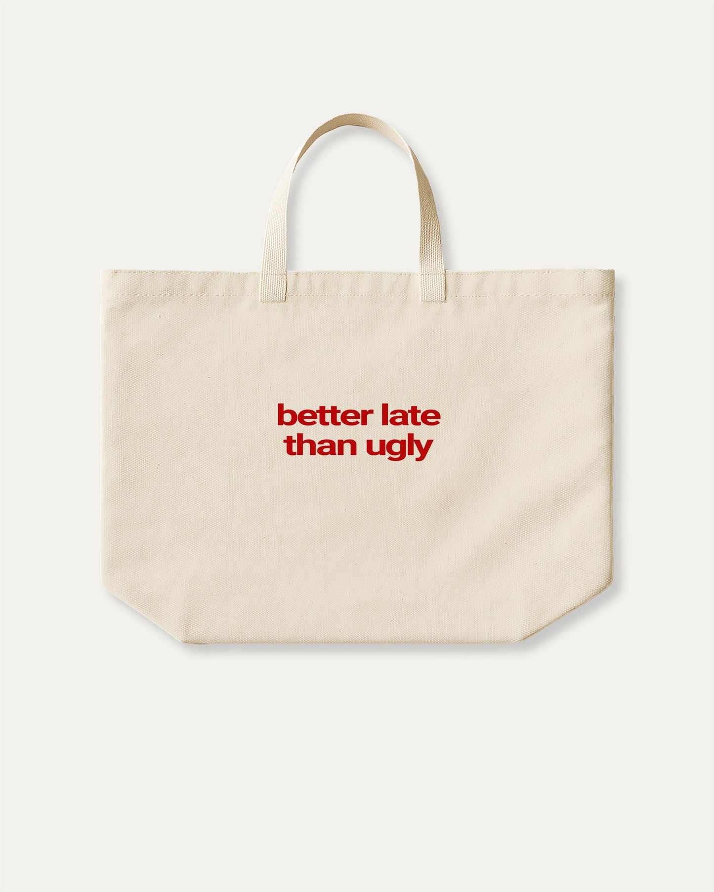 Better Late Than Ugly cotton canvas tote bag with humorous graphic, perfect for everyday carry. A must-have aesthetic accessory, great for shopping, school, or casual days. Special gifts for friends. Natural canvas bag