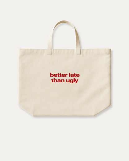 Better Late Than Ugly cotton canvas tote bag with humorous graphic, perfect for everyday carry. A must-have aesthetic accessory, great for shopping, school, or casual days. Special gifts for friends. Natural canvas bag