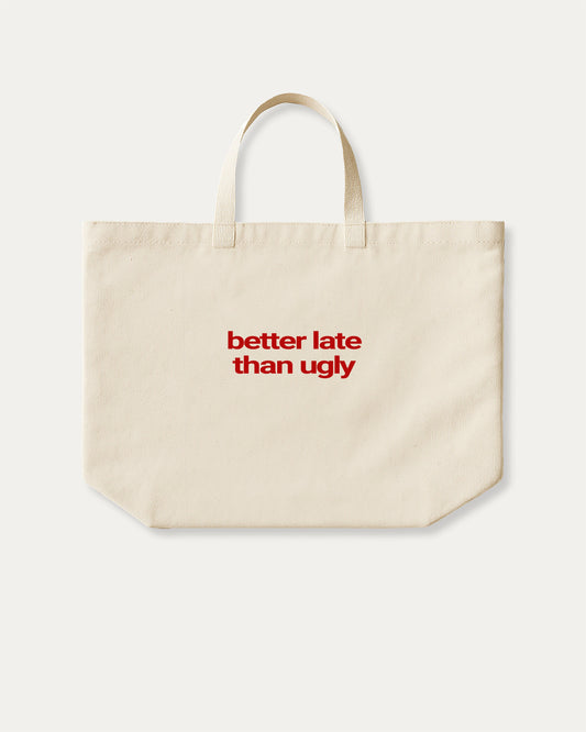 Better Late Than Ugly cotton canvas tote bag with humorous graphic, perfect for everyday carry. A must-have aesthetic accessory, great for shopping, school, or casual days. Special gifts for friends. Natural canvas bag
