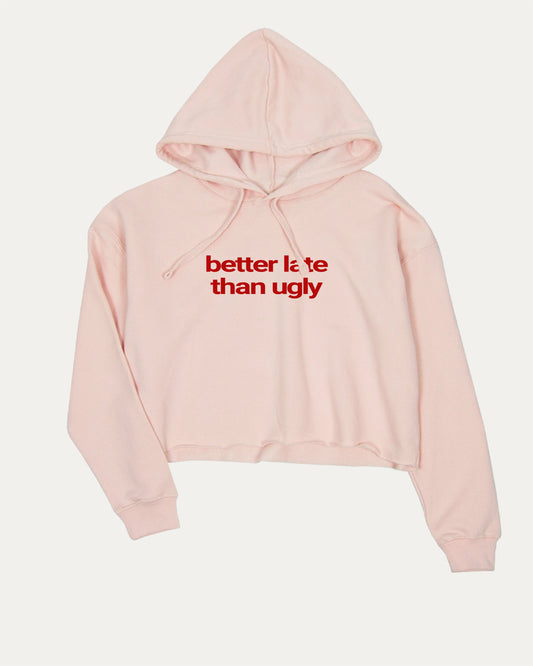 Better Late Than Ugly stylish cropped hoodie with aesthetic graphic, perfect for women. A must-have cropped streetwear piece, cute and edgy fashion. Pink crop top