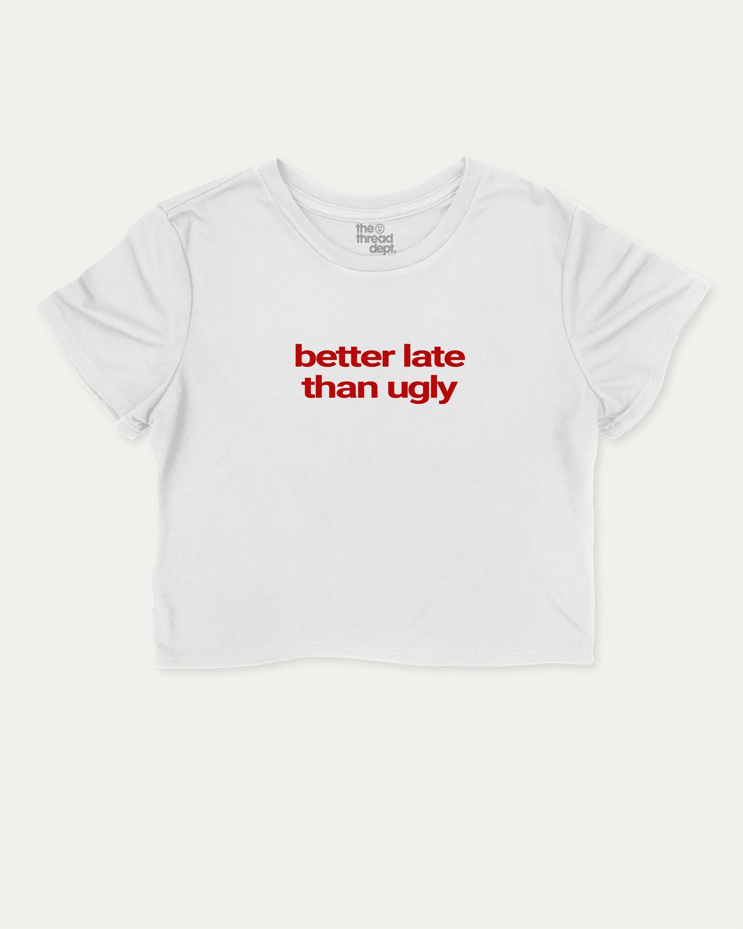 Better Late Than Ugly cute and trendy crop tee with nostalgic graphic, perfect for women. A must-have cropped aesthetic shirt, ideal for daily outfits and casual days. White crop tee