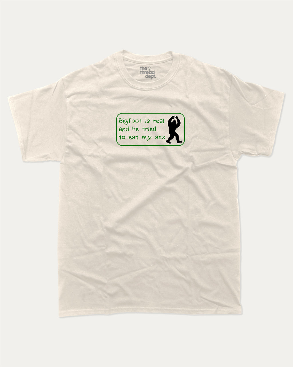 Bigfoot Is Real graphic tee with bold and humorous print, funny and trendy  graphic. Bigfoot Graphic T shirt, Mythical Graphic Tee,  Perfect for adults and gift-giving. Cream shirt.