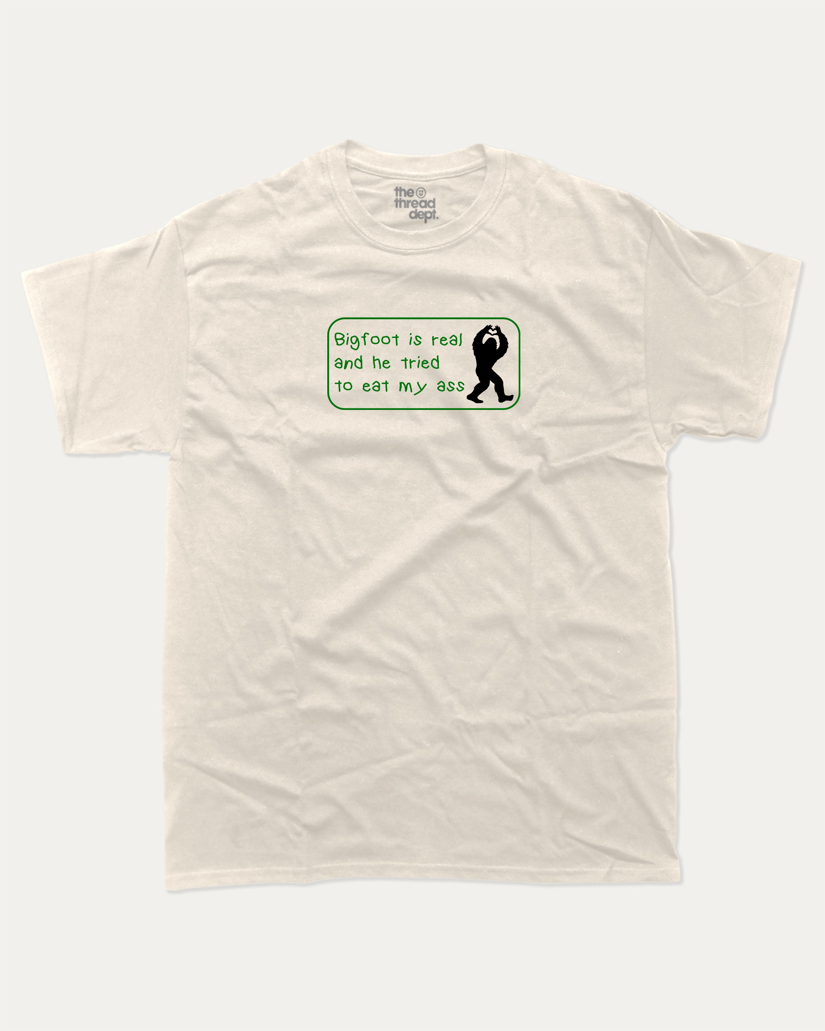 Bigfoot Is Real graphic tee with bold and humorous print, funny and trendy  graphic. Bigfoot Graphic T shirt, Mythical Graphic Tee,  Perfect for adults and gift-giving. Cream shirt.