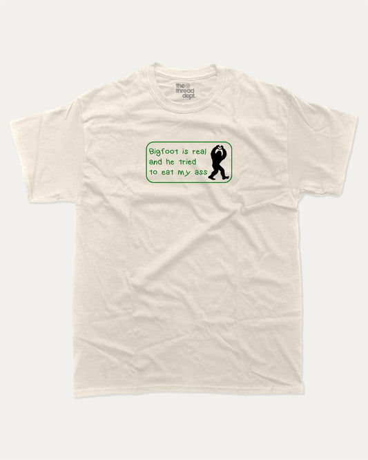 Bigfoot Is Real graphic tee with bold and humorous print, funny and trendy  graphic. Bigfoot Graphic T shirt, Mythical Graphic Tee,  Perfect for adults and gift-giving. Cream shirt.