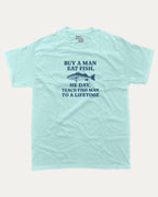 Buy A Man Eat Fish He Day Teach Fish Man To A Lifetime graphic tee with bold and humorous print, funny and trendy graphic. Perfect for adults and gift-giving. Celadon shirt.