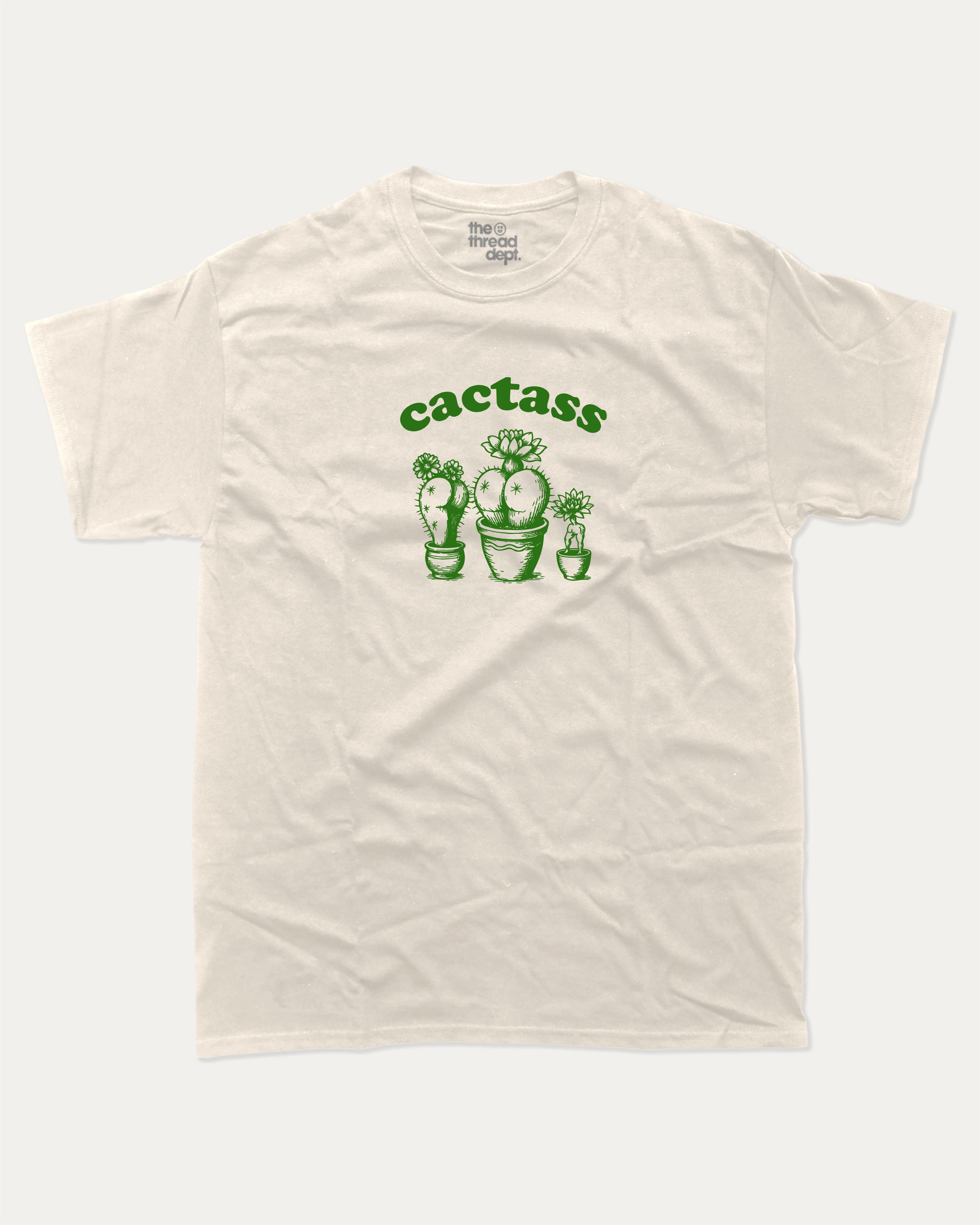 Cactass graphic tee with bold and humorous print, funny and trendy graphic. Perfect for adults and gift-giving. Cream shirt.