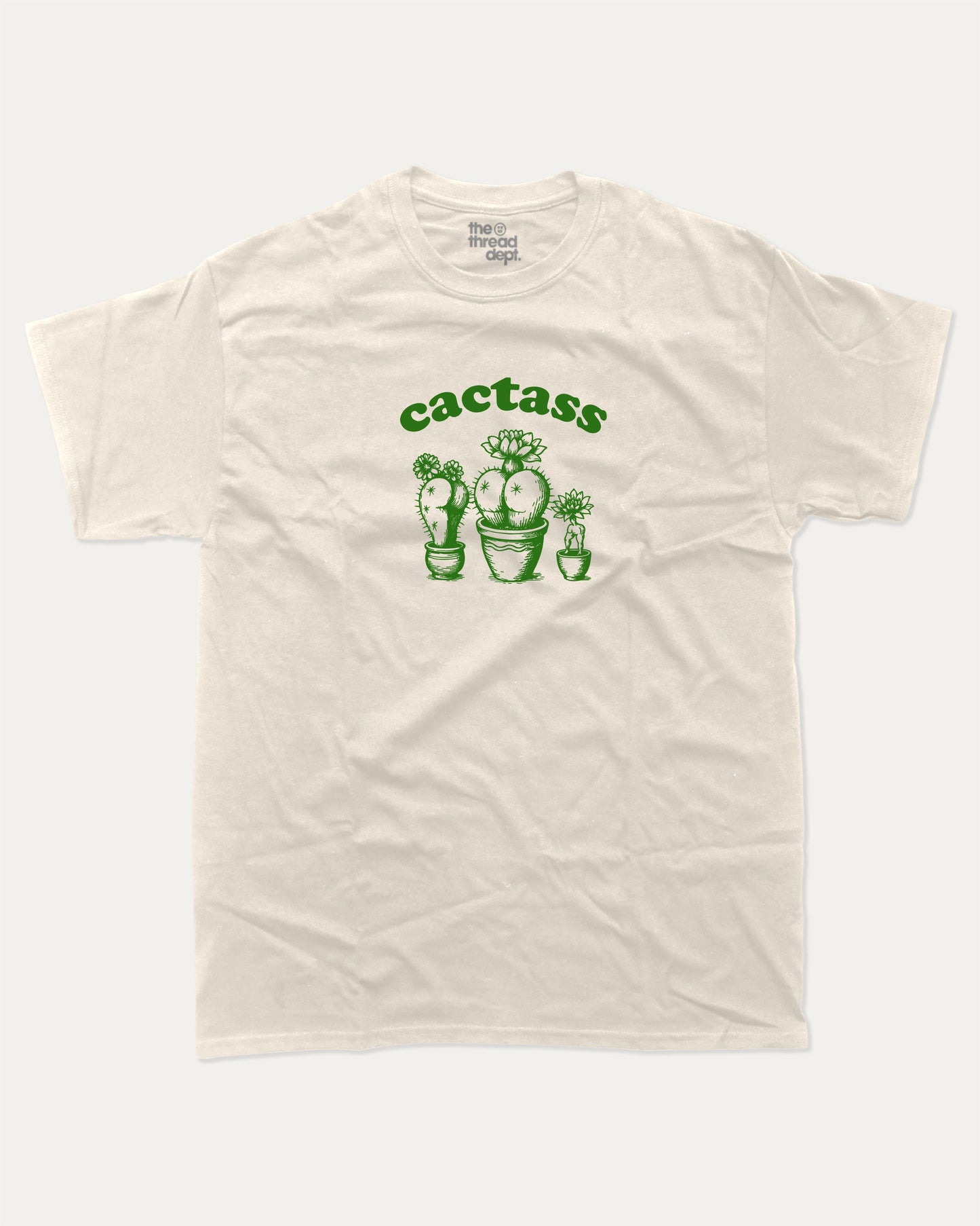 Cactass graphic tee with bold and humorous print, funny and trendy graphic. Perfect for adults and gift-giving. Cream shirt.