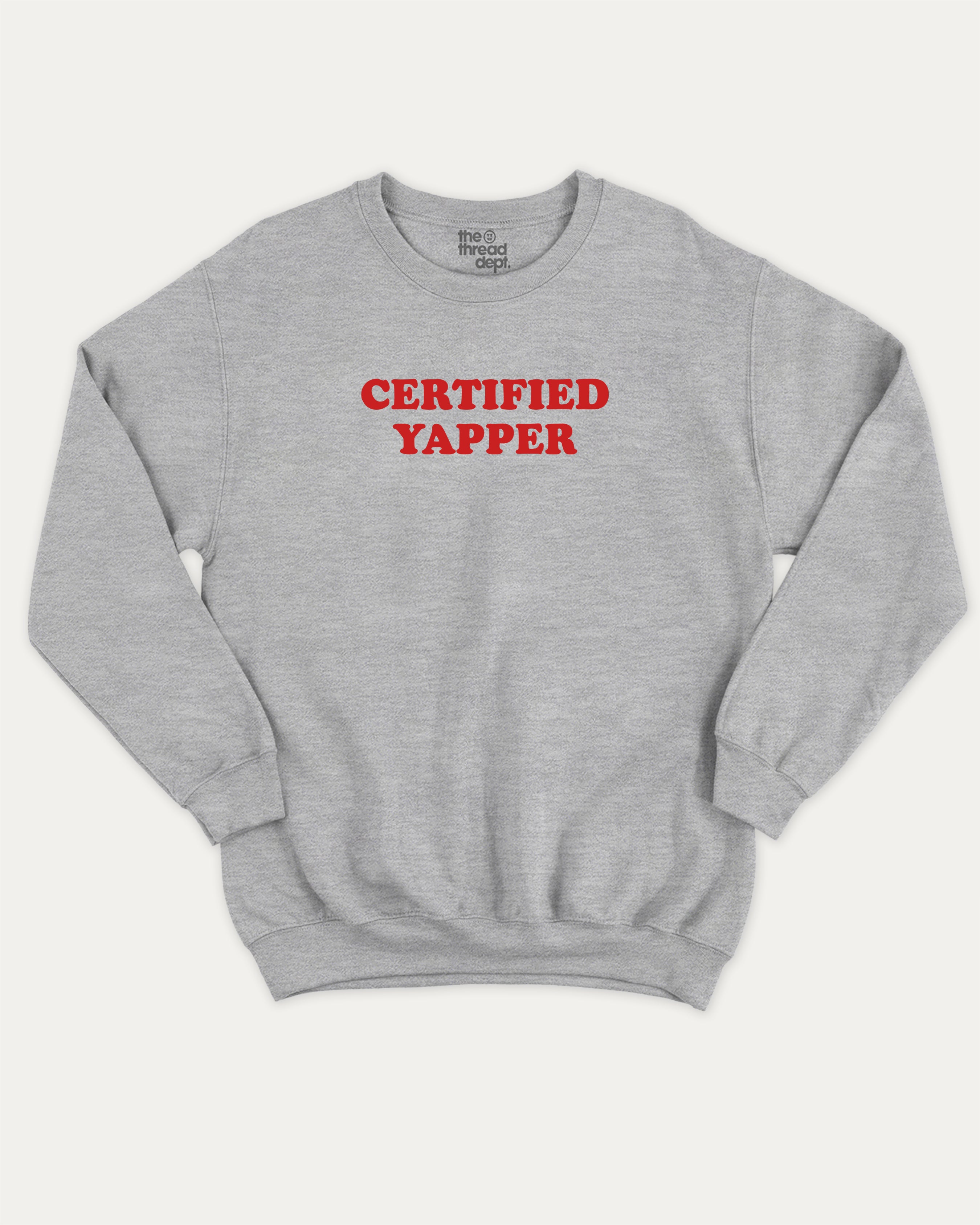 Certified Yapper graphic sweatshirt with bold and humorous print, warm and meme graphic for everyday wear. Perfect for adults and gift-giving. Heather Grey pullover.