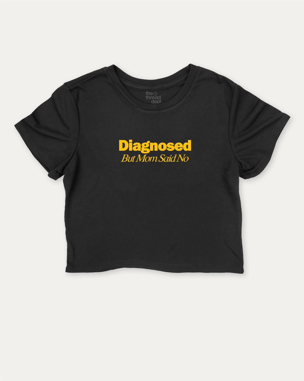 Diagnosed But Mom Said No graphic crop tee with funny and trendy slogan print, perfect for women’s casual looks or layering. Black crop t-shirt.