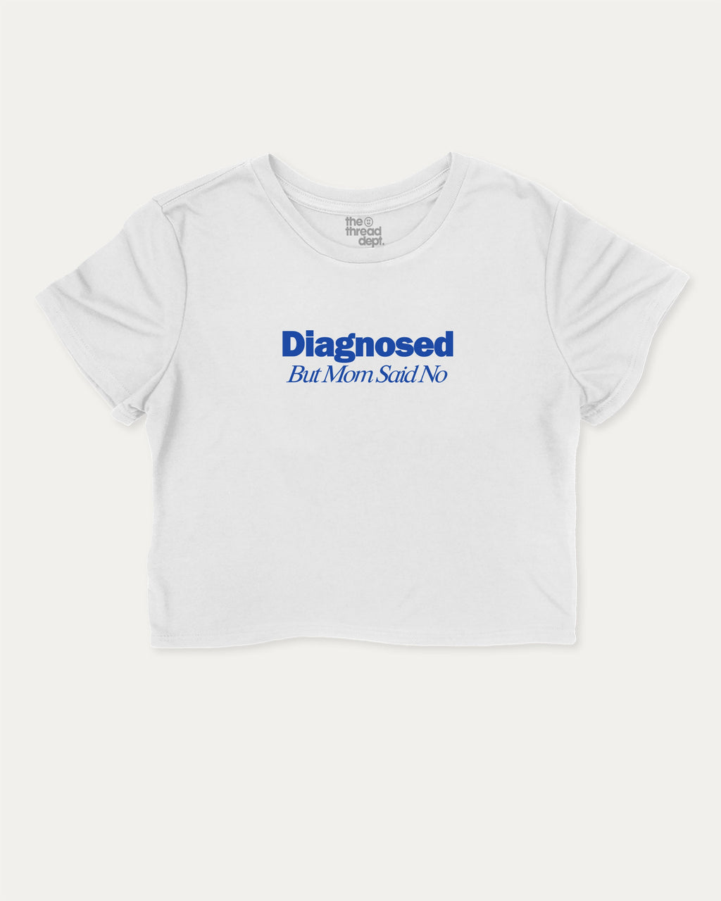 Diagnosed But Mom Said No graphic crop tee with funny and trendy slogan print, perfect for women’s casual looks or layering. White crop t-shirt.