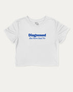 Diagnosed But Mom Said No graphic crop tee with funny and trendy slogan print, perfect for women’s casual looks or layering. White crop t-shirt.
