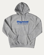 Diagnosed But Mom Said No graphic hoodie with retro and trendy artwork, casual streetwear with bold personality. Great for adults and gifting. Heather Grey hoodie.