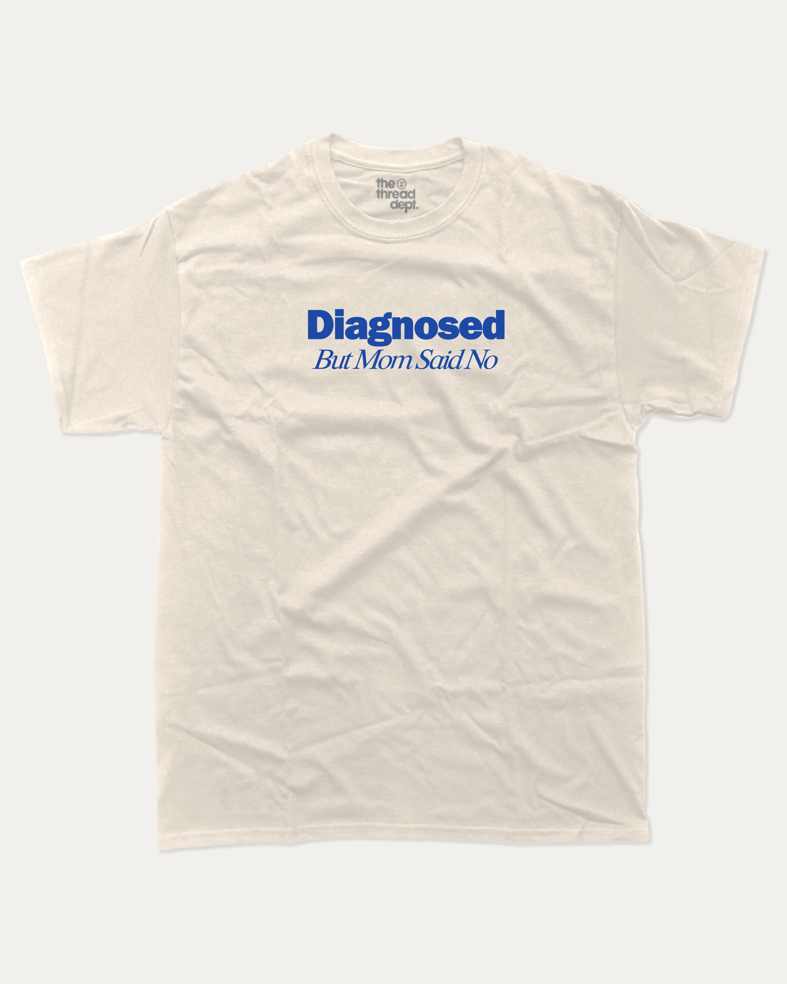 Diagnosed But Mom Said No graphic tee with bold and retro print, funny and trendy graphic. Perfect for adults and gift-giving. Cream shirt.