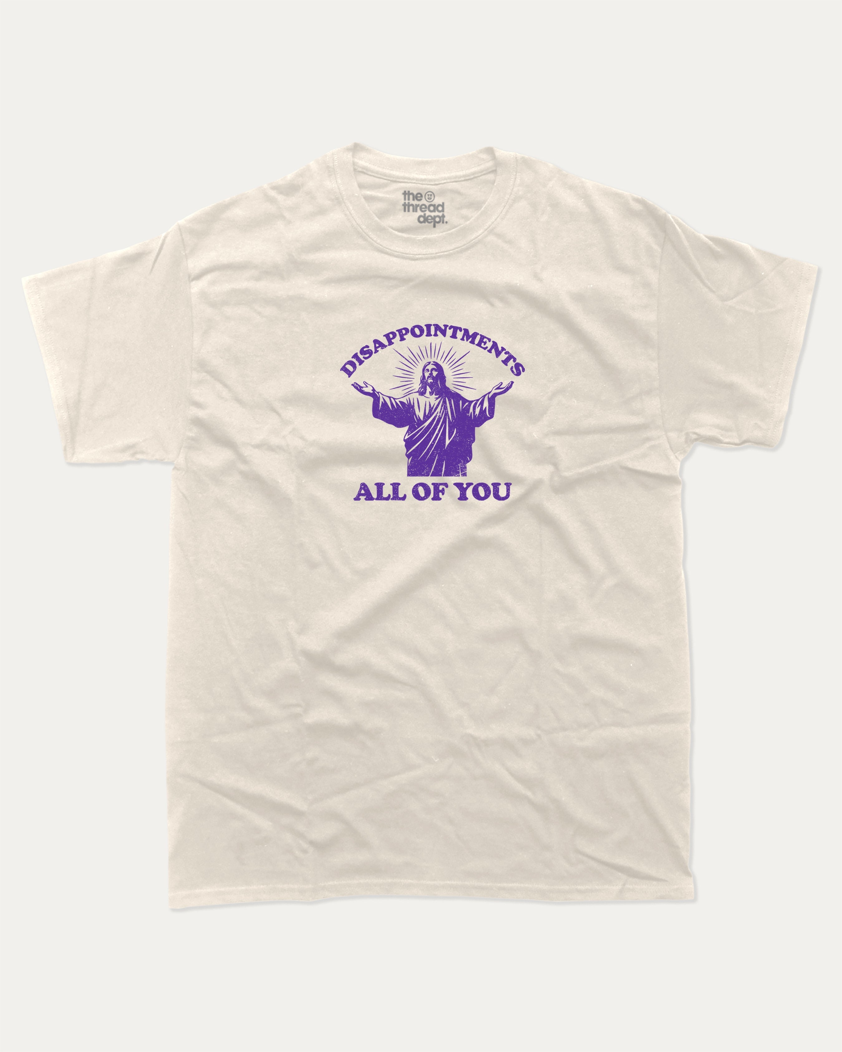 Disappointments all of you graphic tee with bold and humorous print, funny and trendy graphic. Perfect for adults and gift-giving. Cream shirt.