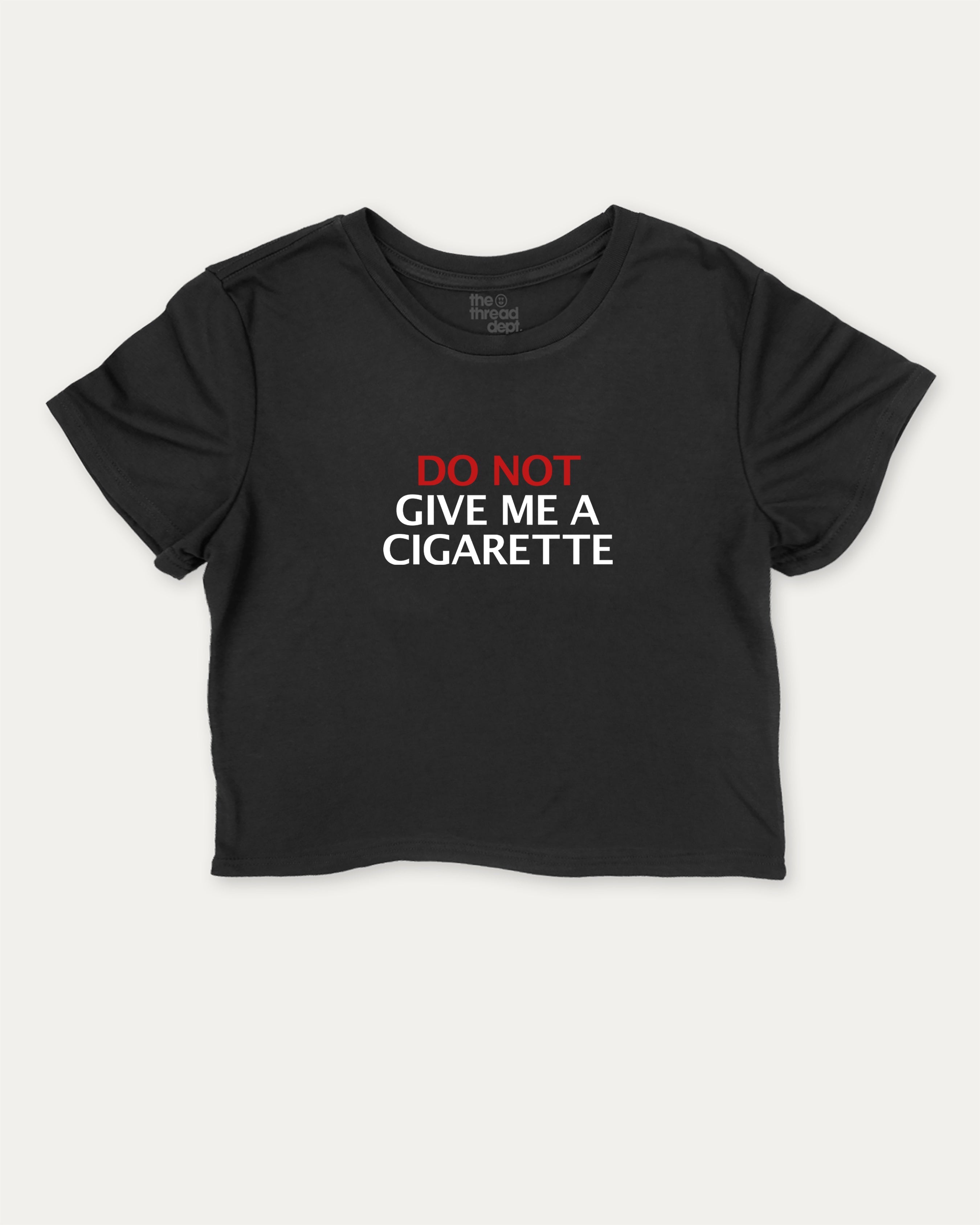 Do Not Give Me A Cigarette graphic crop tee with funny and trendy slogan print, perfect for women’s casual looks or layering. Black crop t-shirt.
