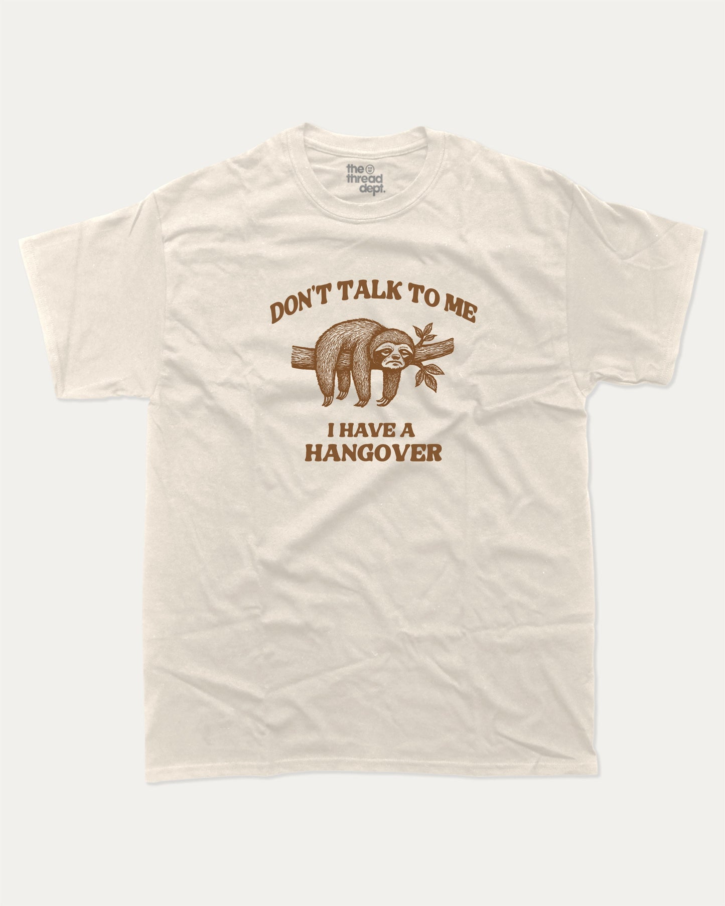 Don't Talk To Me I Have A Hangover graphic t-shirt, Funny quote graphic t-shirt with witty text  great for casual wear, conversation starters, and adding humor to your everyday outfit. Cream.