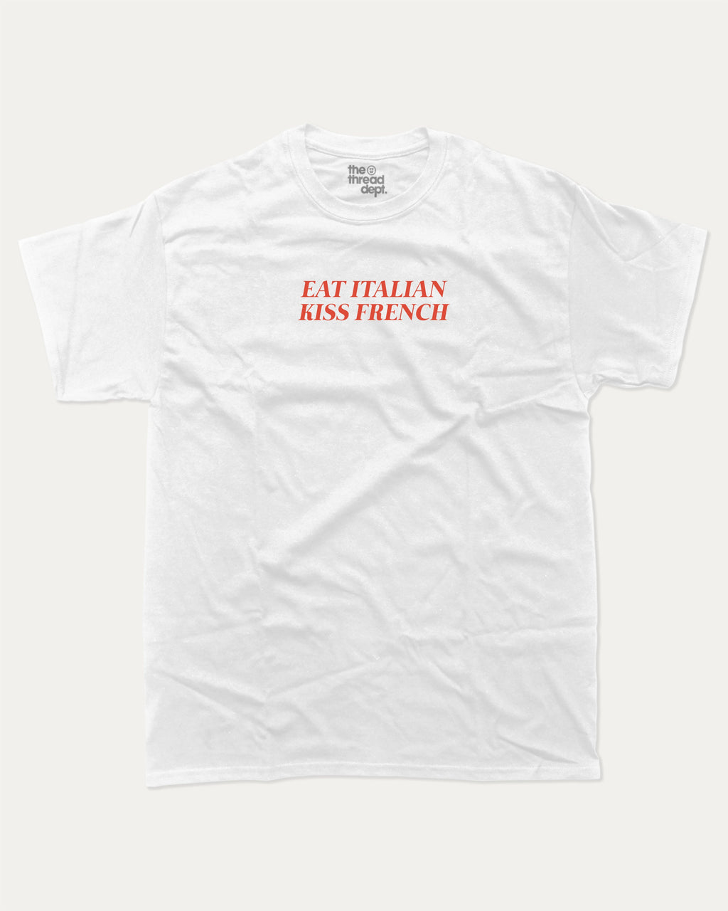 Eat Italian Kiss French graphic tee with bold and humorous print, funny and trendy graphic. Perfect for adults and gift-giving. White shirt.