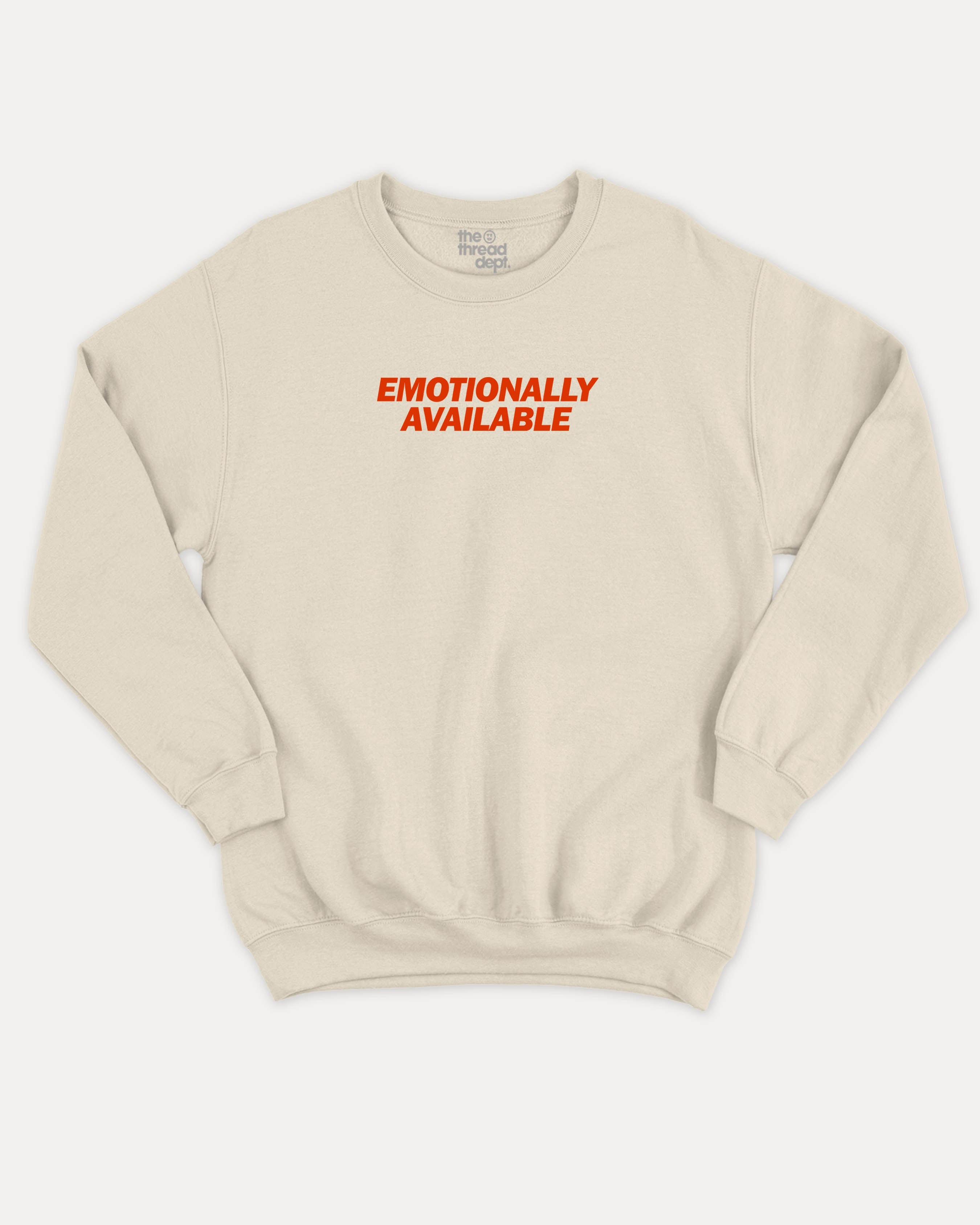 Beige sweatshirt with 'EMOTIONALLY AVAILABLE' text in red on a white background