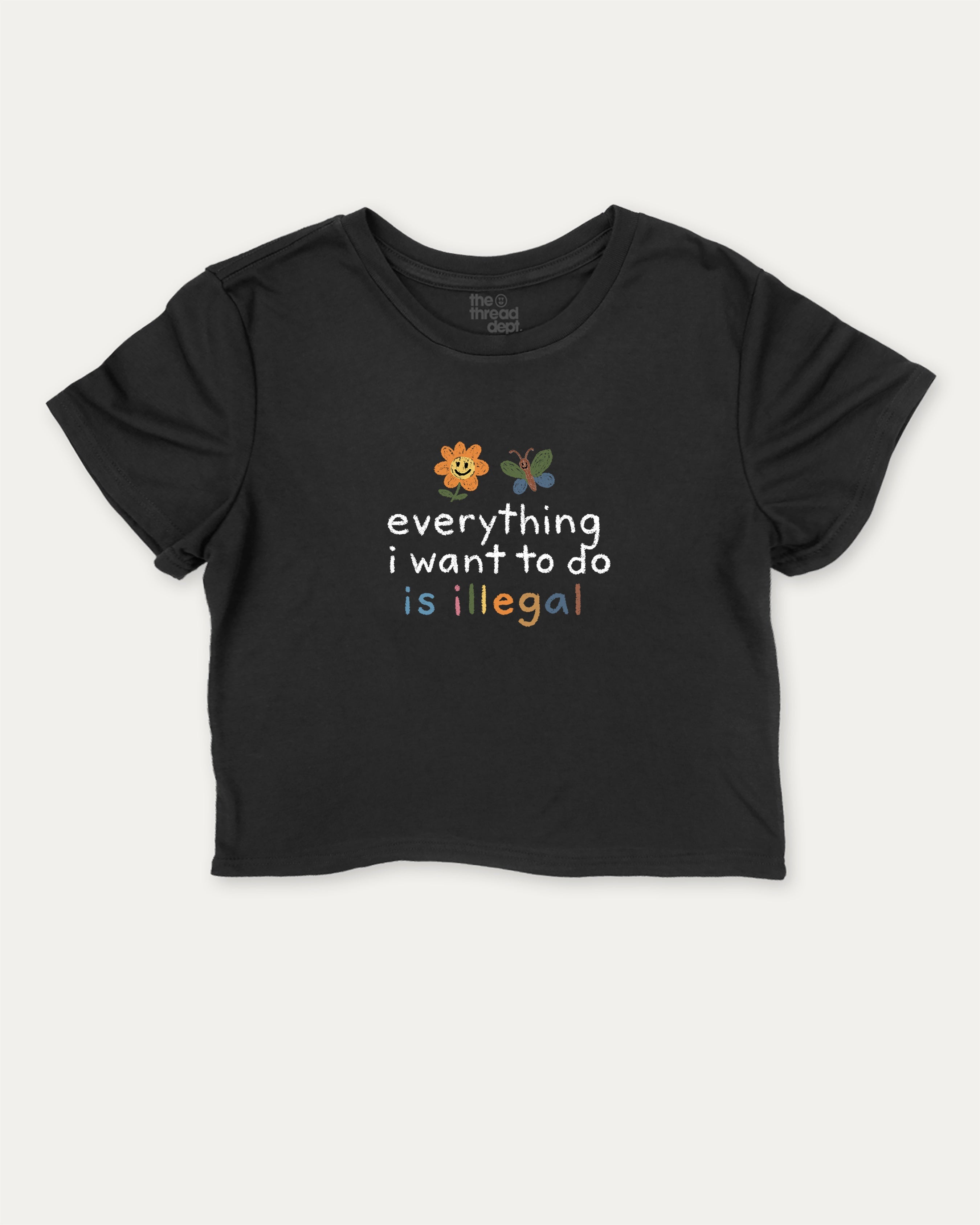 Everything I Want To Do Is Illegal graphic crop tee with funny and trendy slogan print, perfect for women’s casual looks or layering. Black crop t-shirt.