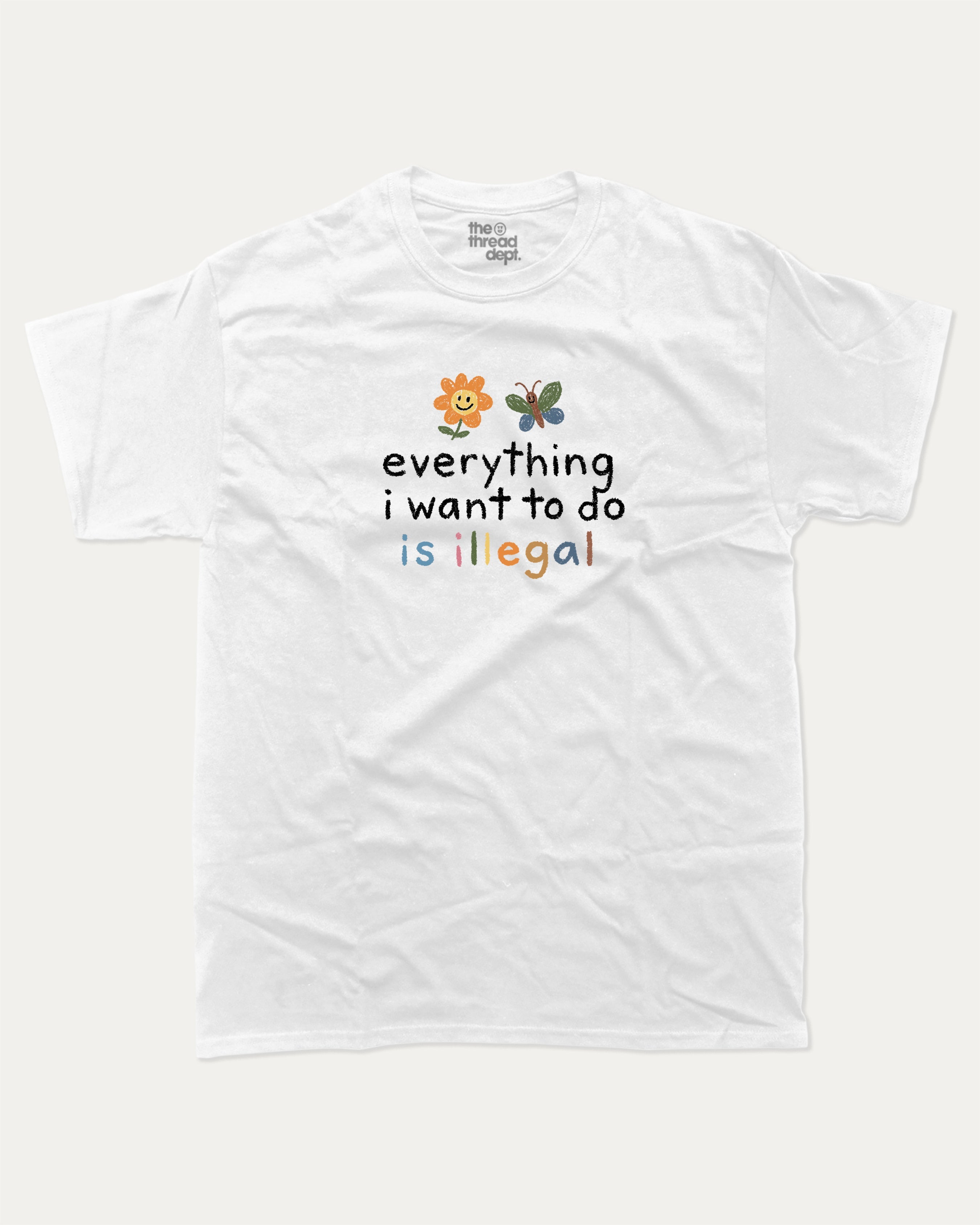 Everything I Want To Do Is Illegal graphic tee with bold and humorous print, funny and trendy graphic. Perfect for adults and gift-giving. White shirt.