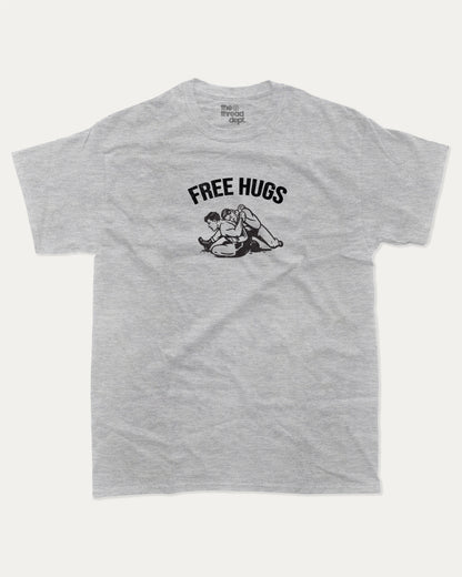FREE HUGS graphic tee with bold and humorous print, funny and trendy graphic. Perfect for adults and gift-giving. Heather Grey shirt.