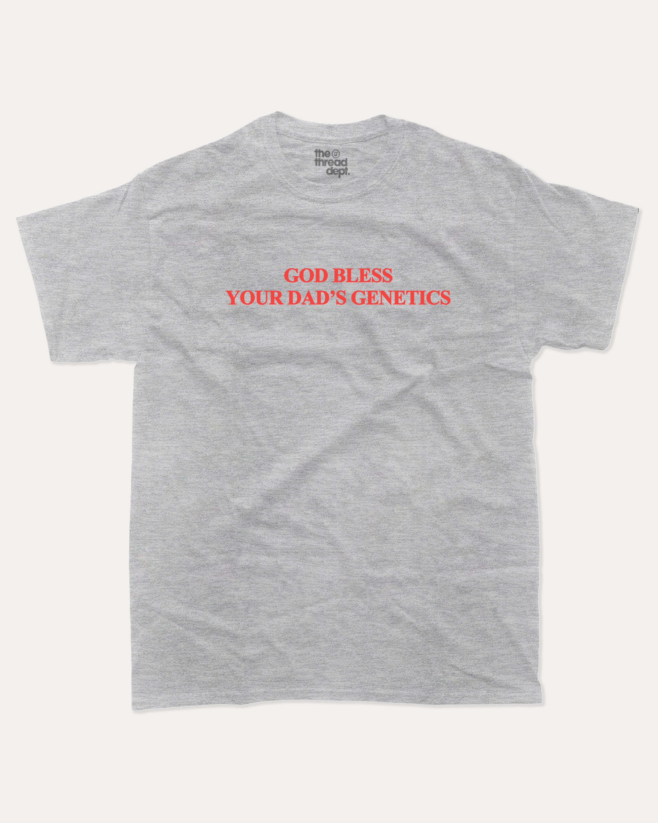 God bless your dad's genetics graphic tee with bold and humorous print, Funny Pun Graphic T shirt, Pun Graphic T shirt, funny and trendy graphic. Perfect for adults and gift-giving. Heather Grey shirt.