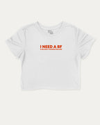 I Need a BF graphic crop tee with funny and trendy slogan print, perfect for women_ casual looks or layering. White crop t-shirt.