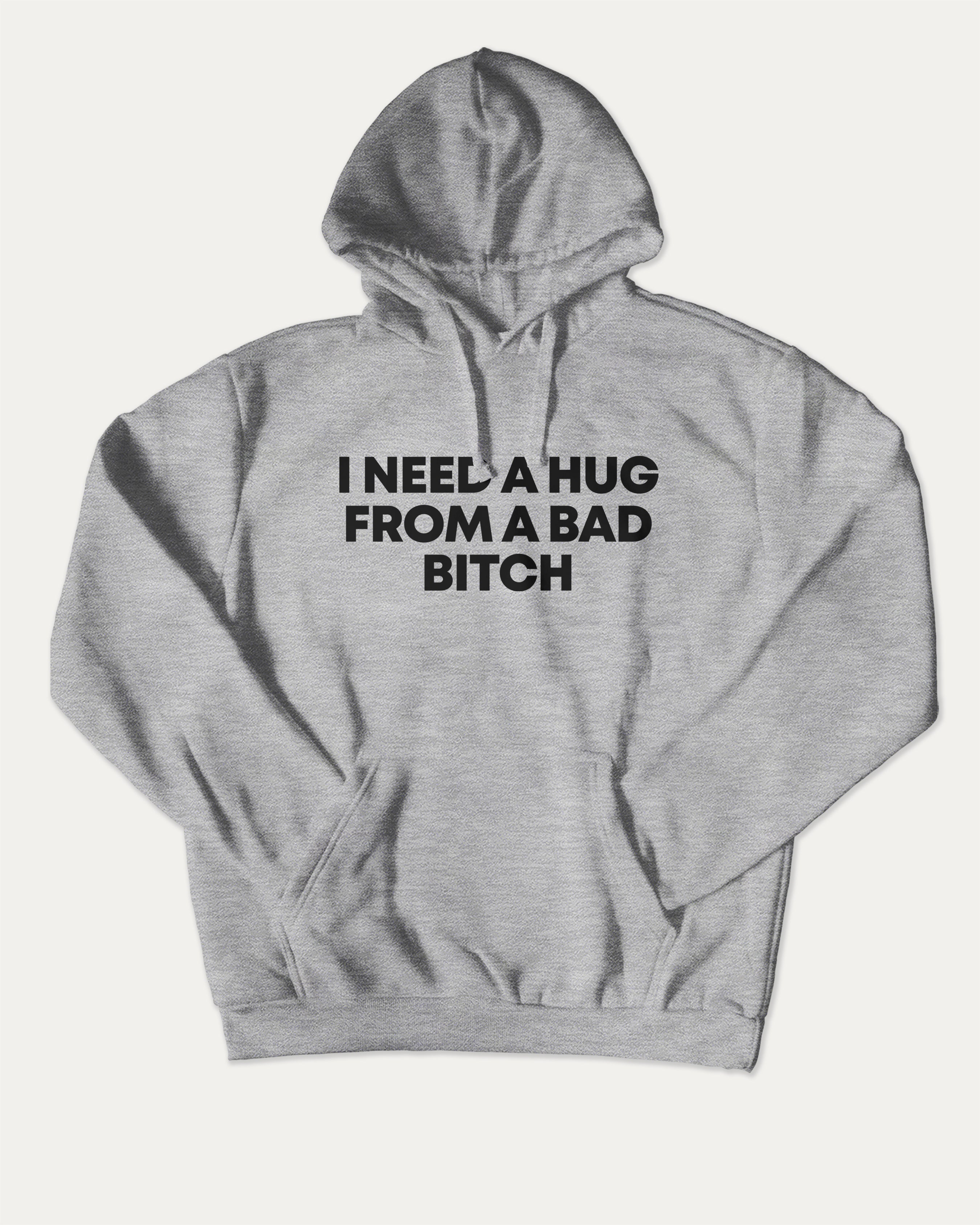 I need a hug from a bad bitch graphic hoodie with funny and trendy artwork, casual streetwear with bold personality. Great for adults and gifting. Heather Grey hoodie.