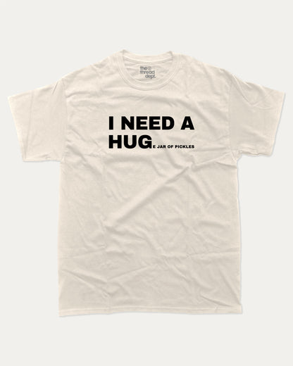 I Need A Huge Jar Of Pickles graphic t-shirt, perfect for adults. A must-have funny tee, trending meme shirt, unique gift idea. Cream.