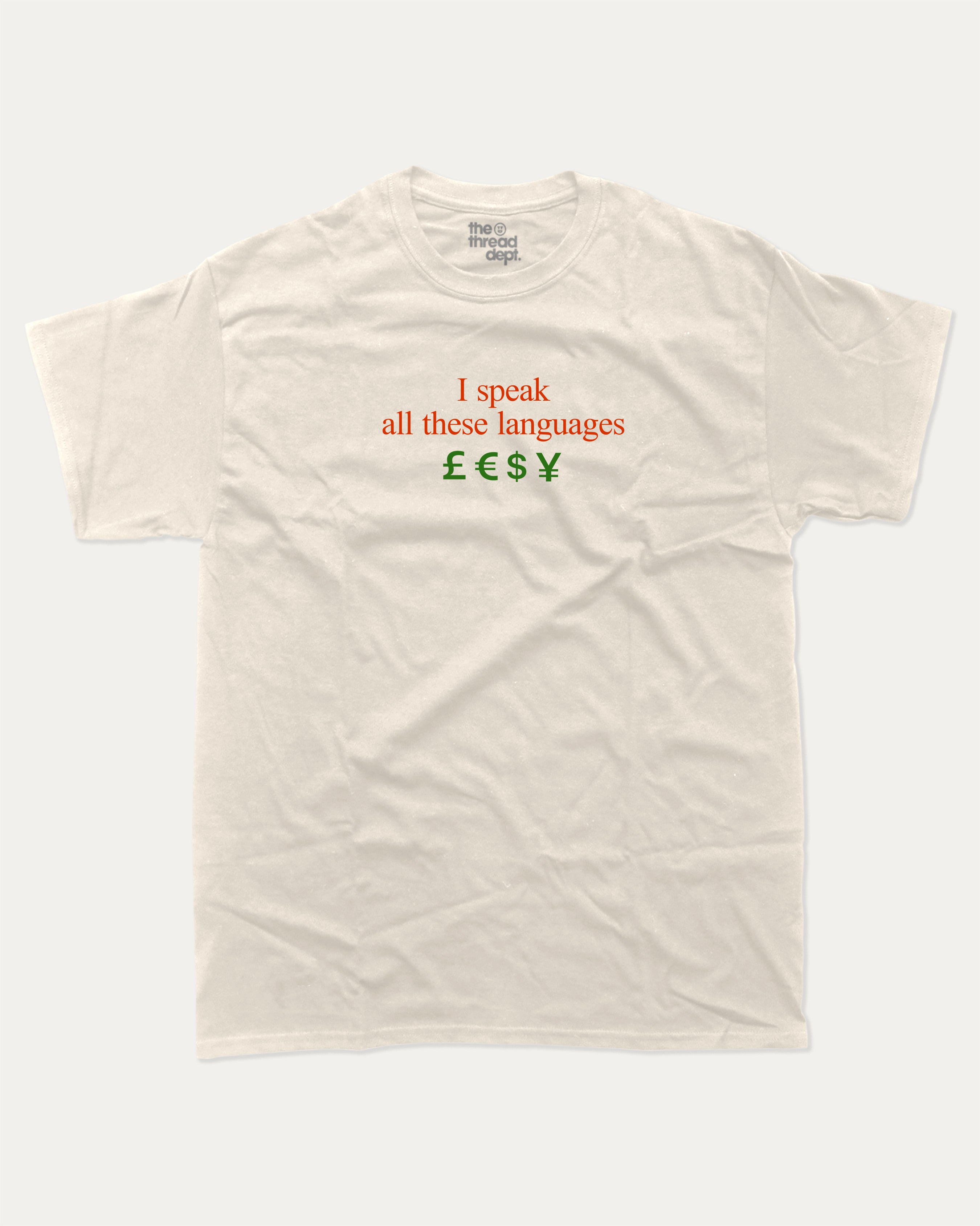 I speak all these languages graphic tee with bold and humorous print, Funny Pun Graphic T shirt, Pun Graphic T shirt, funny and trendy graphic. Perfect for adults and gift-giving. Cream shirt.