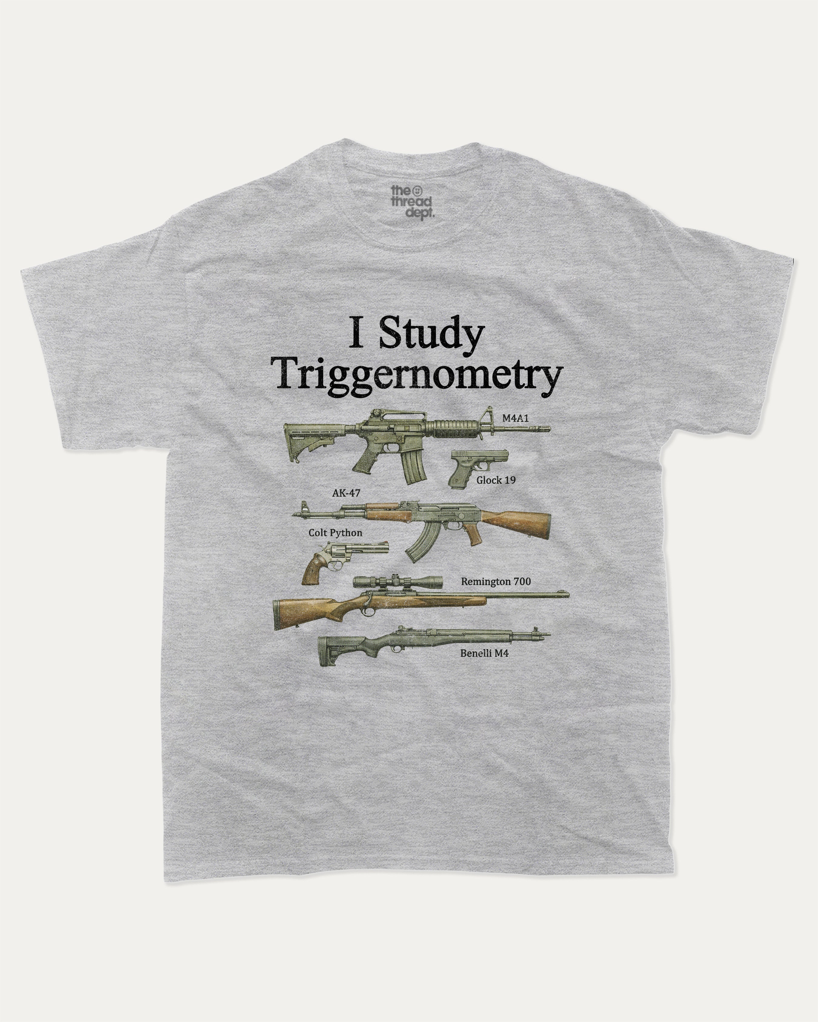I Study Triggernometry graphic tee with bold and humorous print, Funny meme graphic tee, funny and trendy graphic. Perfect for adults and gift-giving. Heather Grey shirt.