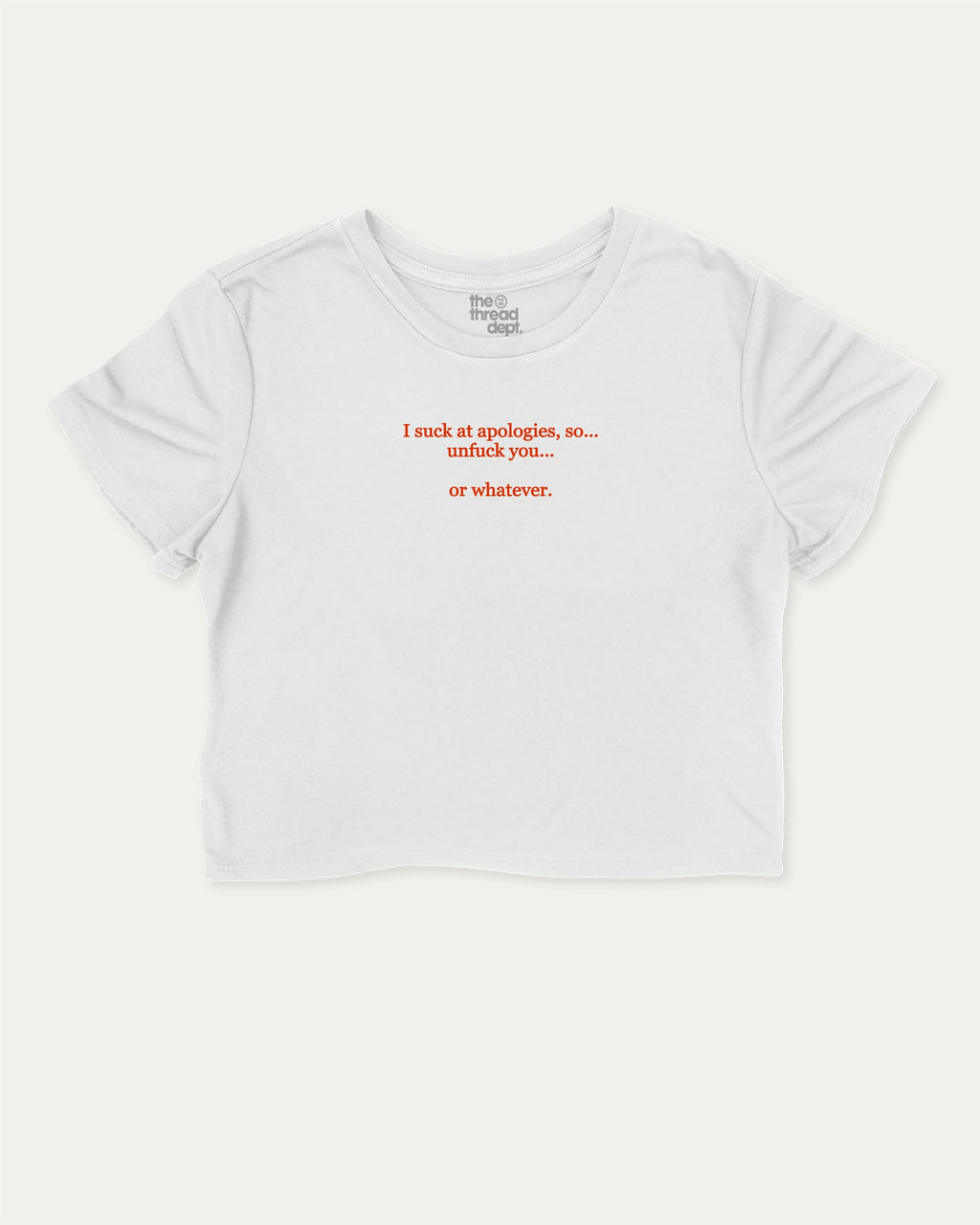 I suck at apologies graphic crop tee with funny and trendy slogan print, perfect for women_ casual looks or layering. White crop t-shirt.