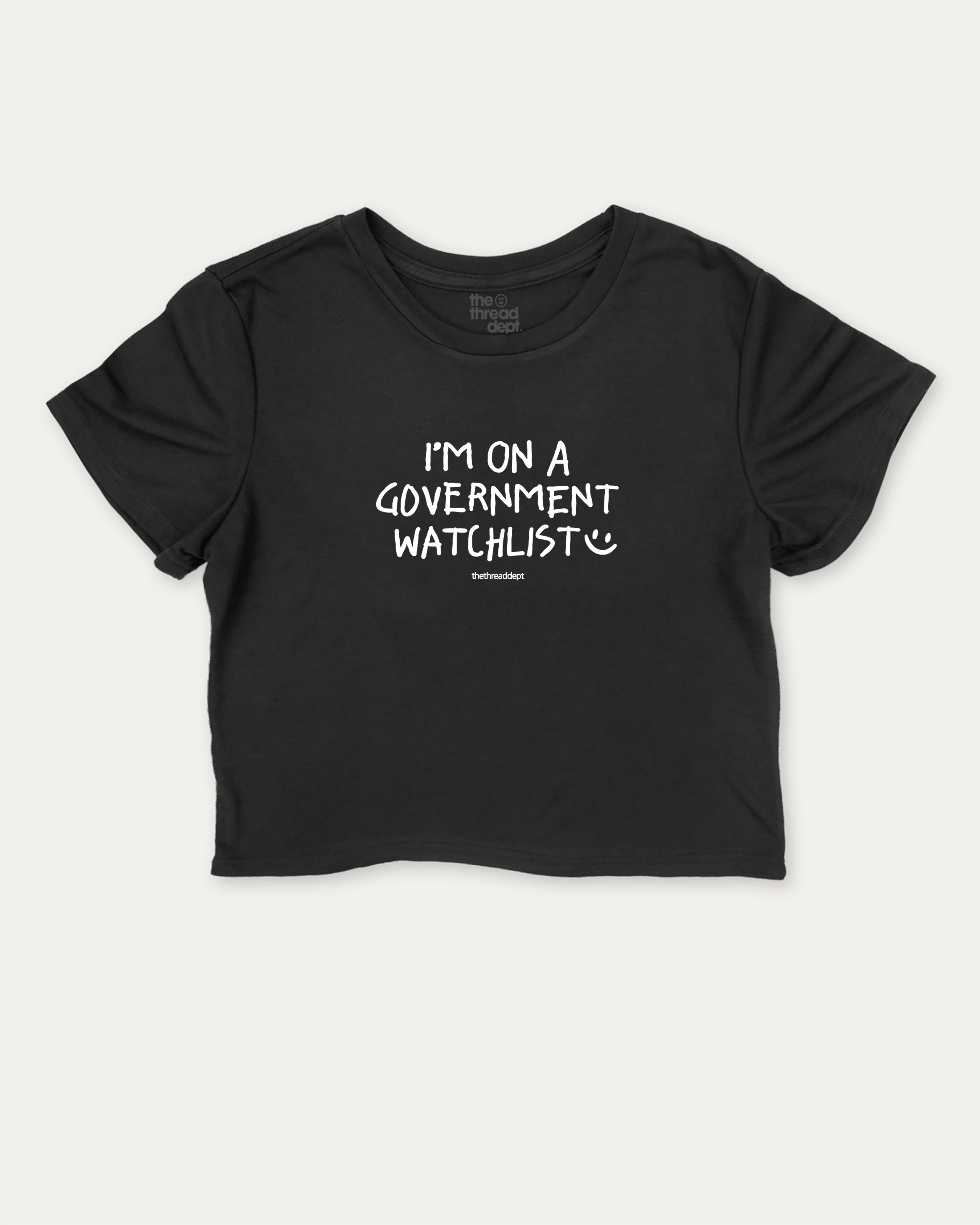 I'm on a government watchlist graphic crop tee with funny and trendy slogan print, perfect for women_ casual looks or layering. Black crop t-shirt.