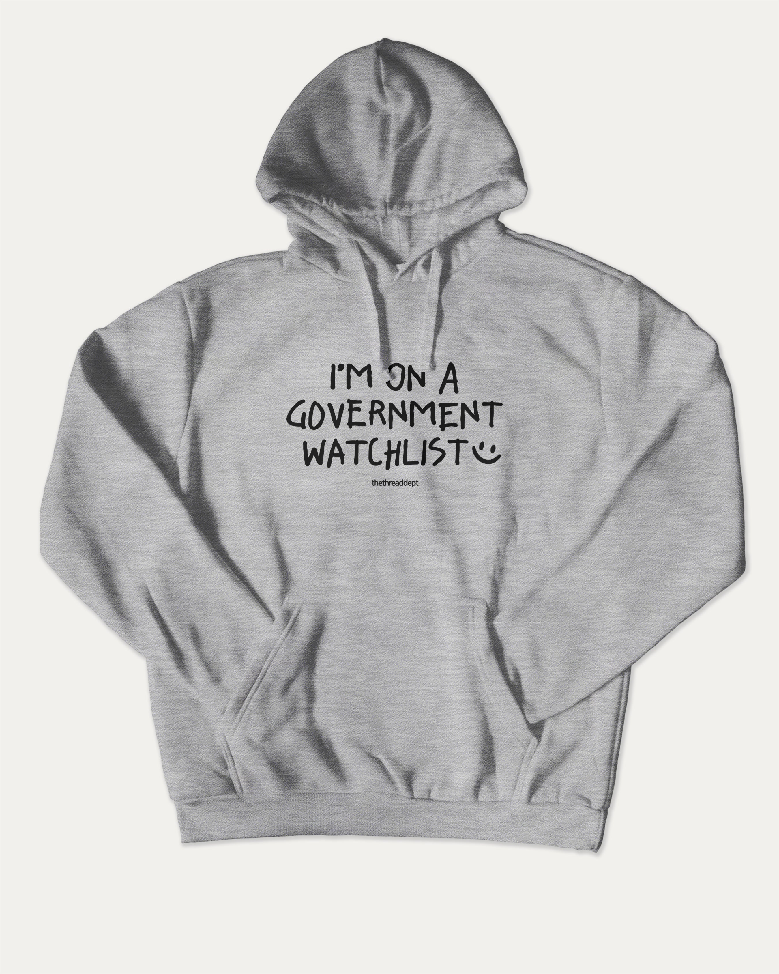 I'm on a government watchlist graphic hoodie with funny and trendy artwork, casual streetwear with bold personality. Great for adults and gifting. Heather Grey hoodie.
