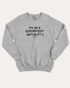I'm on a government watchlist graphic sweatshirt with bold and humorous print, warm and cozy graphic for everyday wear. Perfect for adults and gift-giving. Heather Grey pullover.