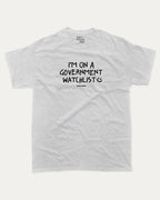 I'm on a government watchlist graphic tee with bold and humorous print, funny and trendy graphic. Perfect for adults and gift-giving. Ash Grey shirt.
